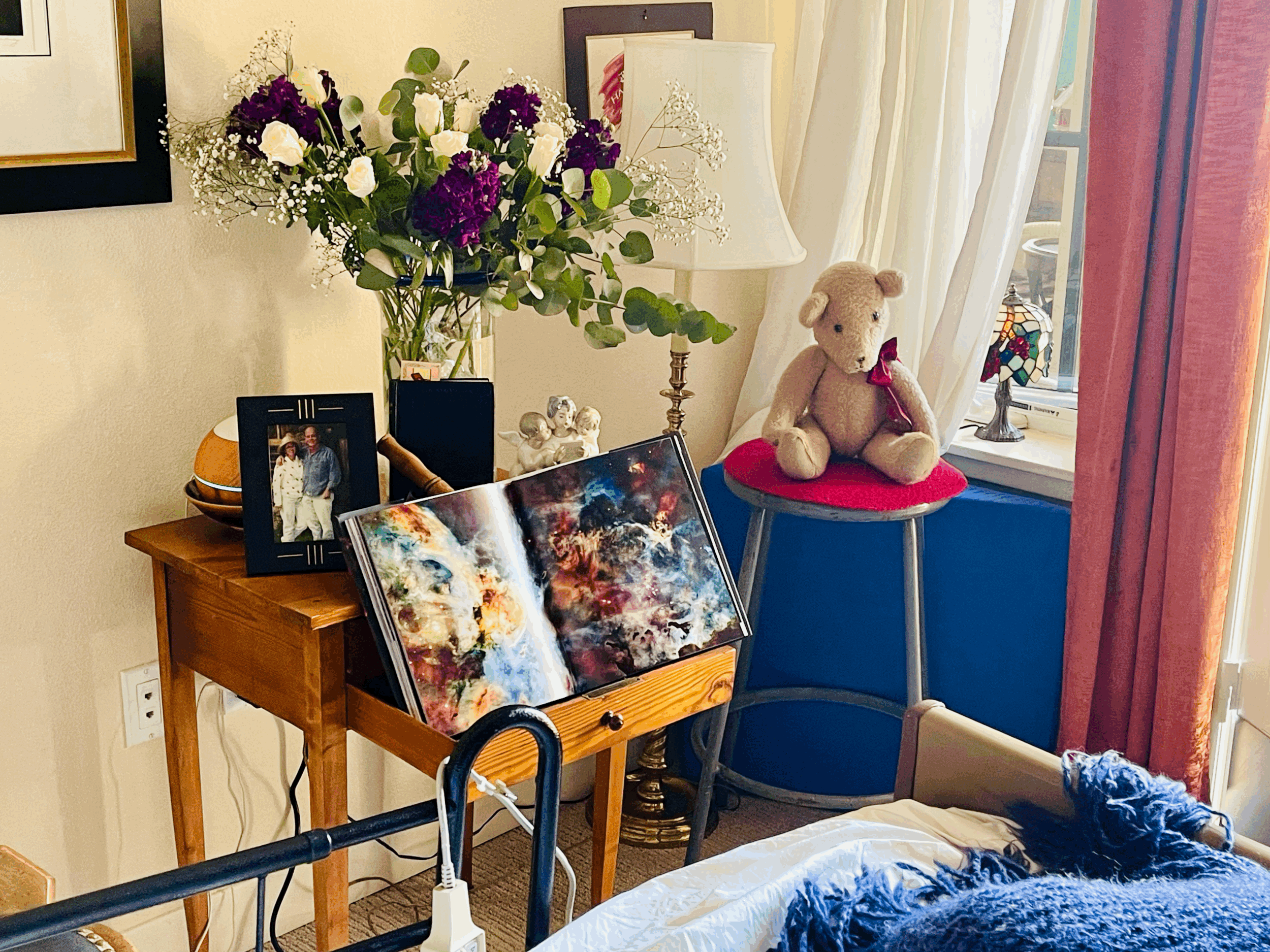 This simple altar, including flowers arranged with the patient’s spouse, became a sacred focal point during a three-day vigil. Following the patient’s passing, the flowers were used in ritual that brought closure to the experience and peace to the family.  The flowers used in the arrangement revealed themselves as the patient’s favorites during the year of visitation and bonding that occurred prior to the beginning of the vigil.