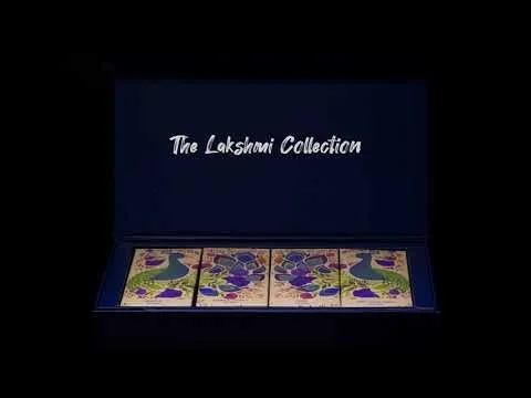 MADHU Chocolate’s dark blue Lakshmi Collection gift box with decorated chocolates.