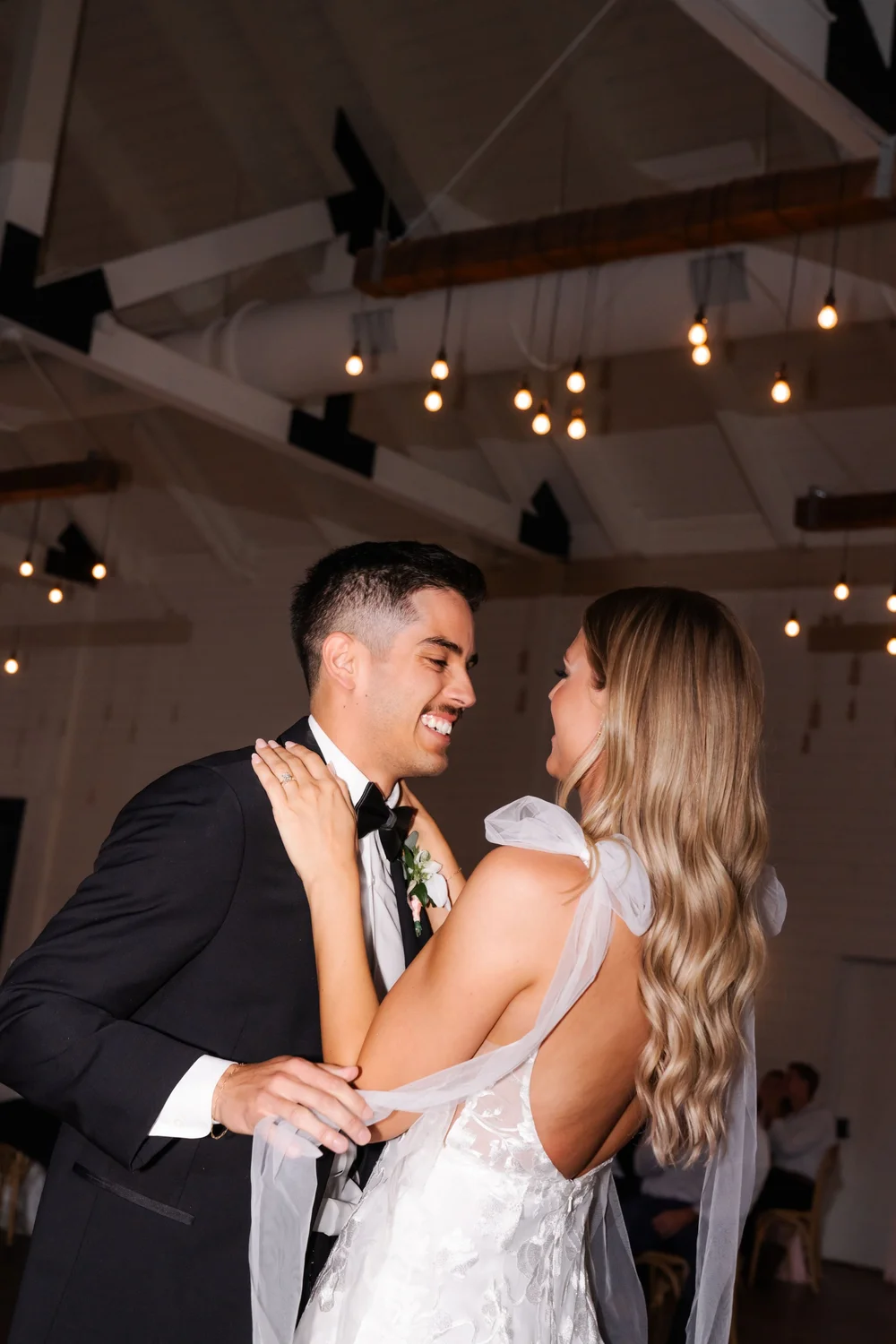 Newlyweds sharing a joyful first dance