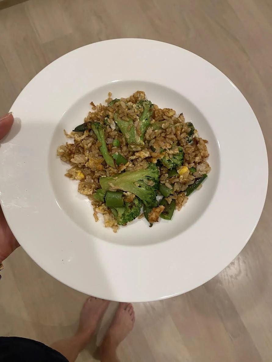 Here’s what you need:Rice - I use brown rice, and often buy the whole foods frozen brown rice (i.e. this is extremely easy to make) Eggs Whatever veggies you want/have (I tend to use broccoli, snap peas, carrots, mushrooms, peas, spinach)Coconut aminos, sesame oil, rice wine vinegar and hot sauce if desired Here's how you make it: Make the rice / microwave the rice depending on the route you take  Saute veggies in a little bit of coconut aminos, sesame oil and rice wine vinegar Add in the rice and more of the coconut aminos/sesame oil/rice wine vinegar to tasteTop with hot sauce and/or avocado if you’d like!