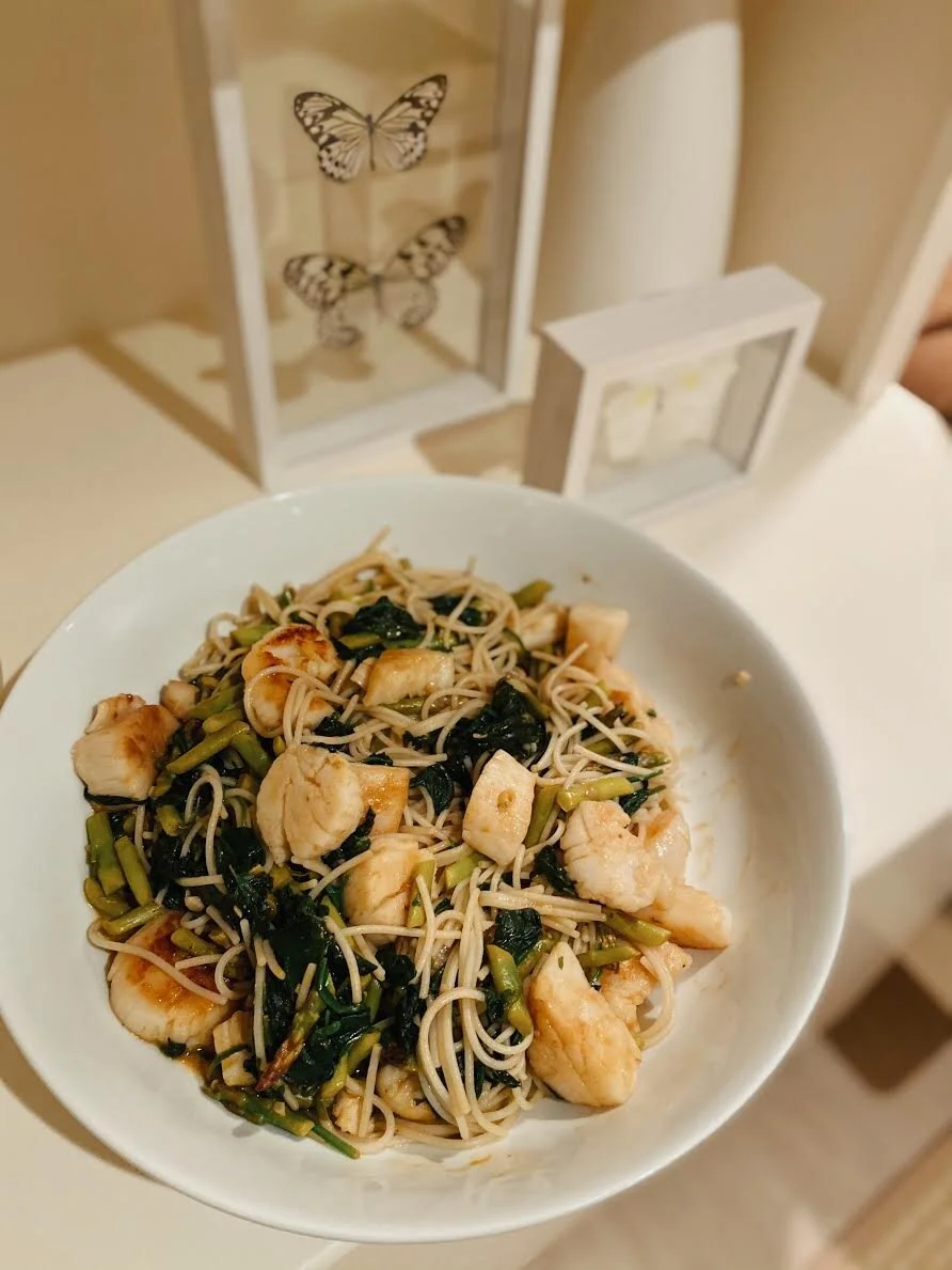 This pasta is all-time! Here’s what you need: Scallops - scallops can be super expensive. Some fish stores sell “broken scallops” which are a bit less expensive and basically just means that restaurants won’t buy them because they are not a perfect round shape Pasta - I use the jovial brown rice spaghetti Veggies - I use spinach and asparagus LemonButter - I use just a bit of Myokos vegan butterParm - Used a little bit of the Viola parm Here’s what you do: Cook the pasta according to the directions Saute the scallops in either olive oil or butter Saute the vegetables in olive oilAdd the cooked pasta to the vegetables, squeeze some lemon (I used a 1/2) and add some butter (I uesd a tablespoon)Add in the scallops and top with some parm