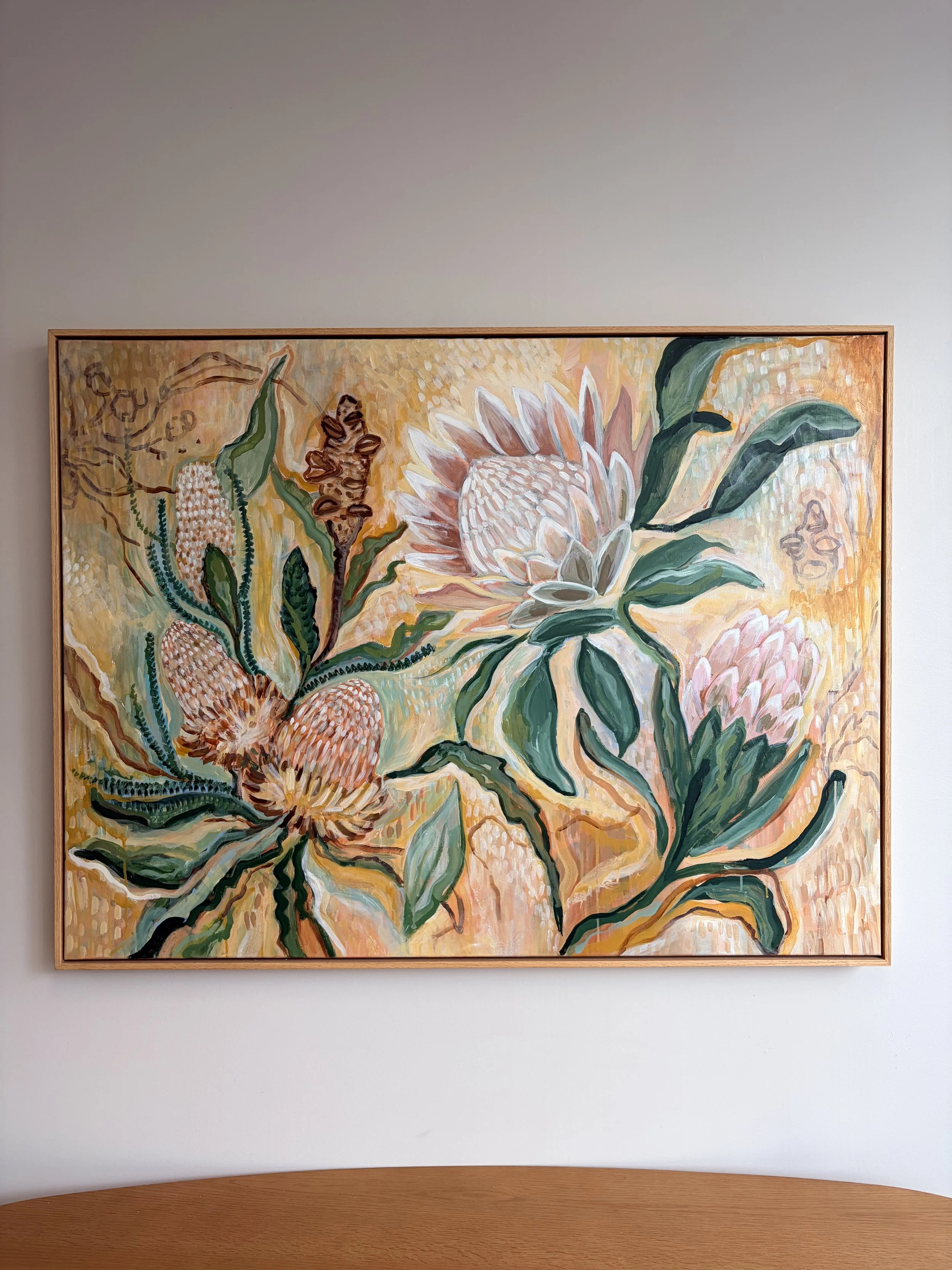 A framed painting made by Alanna Galic —  Native floral abstract painting hung at Home Psychology & Speech Therapy | Caringbah