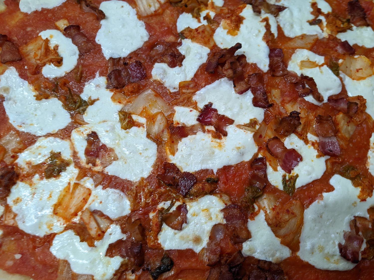 Kimchi + bacon pizza