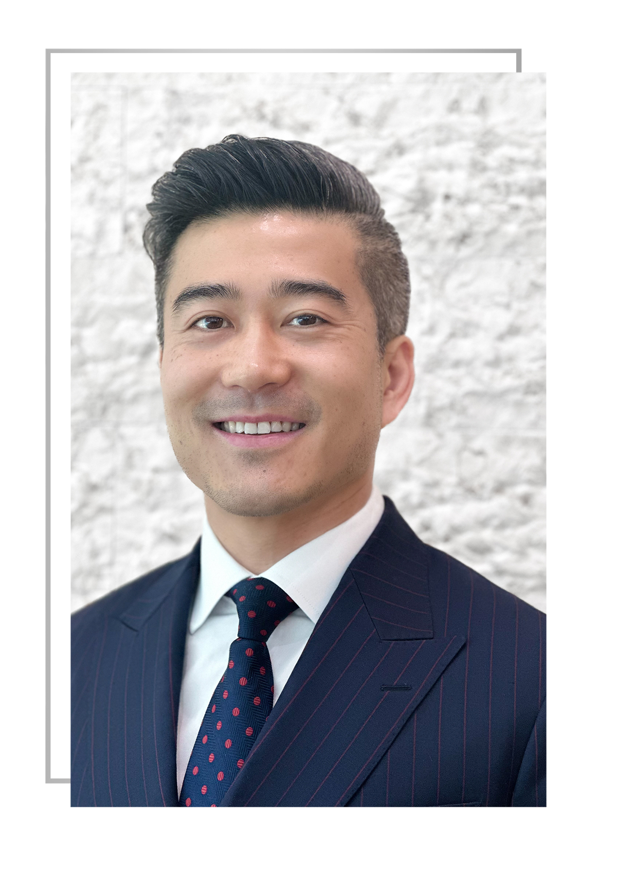 Dr. Kyle Xu, double board-certified plastic and reconstructive surgeon and hand surgeon at Virginia Plastic Surgery