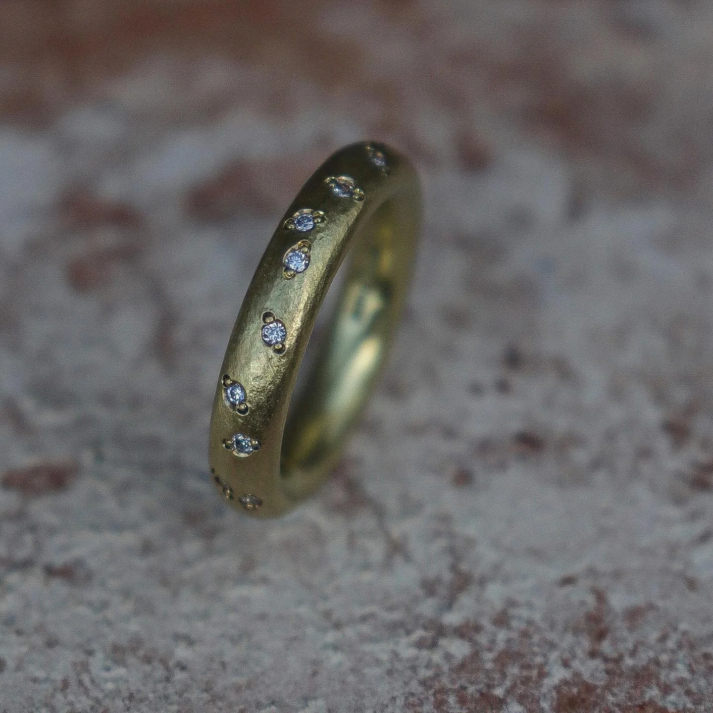 A heavyweight oval band of delicately textured 18ct gold, sprinkled with diamonds.
I love the simplicity of this ring. A bold and timeless design. 
#handmaderings #diamondring #bespokering #handmadeweddingring #scottishjewellery