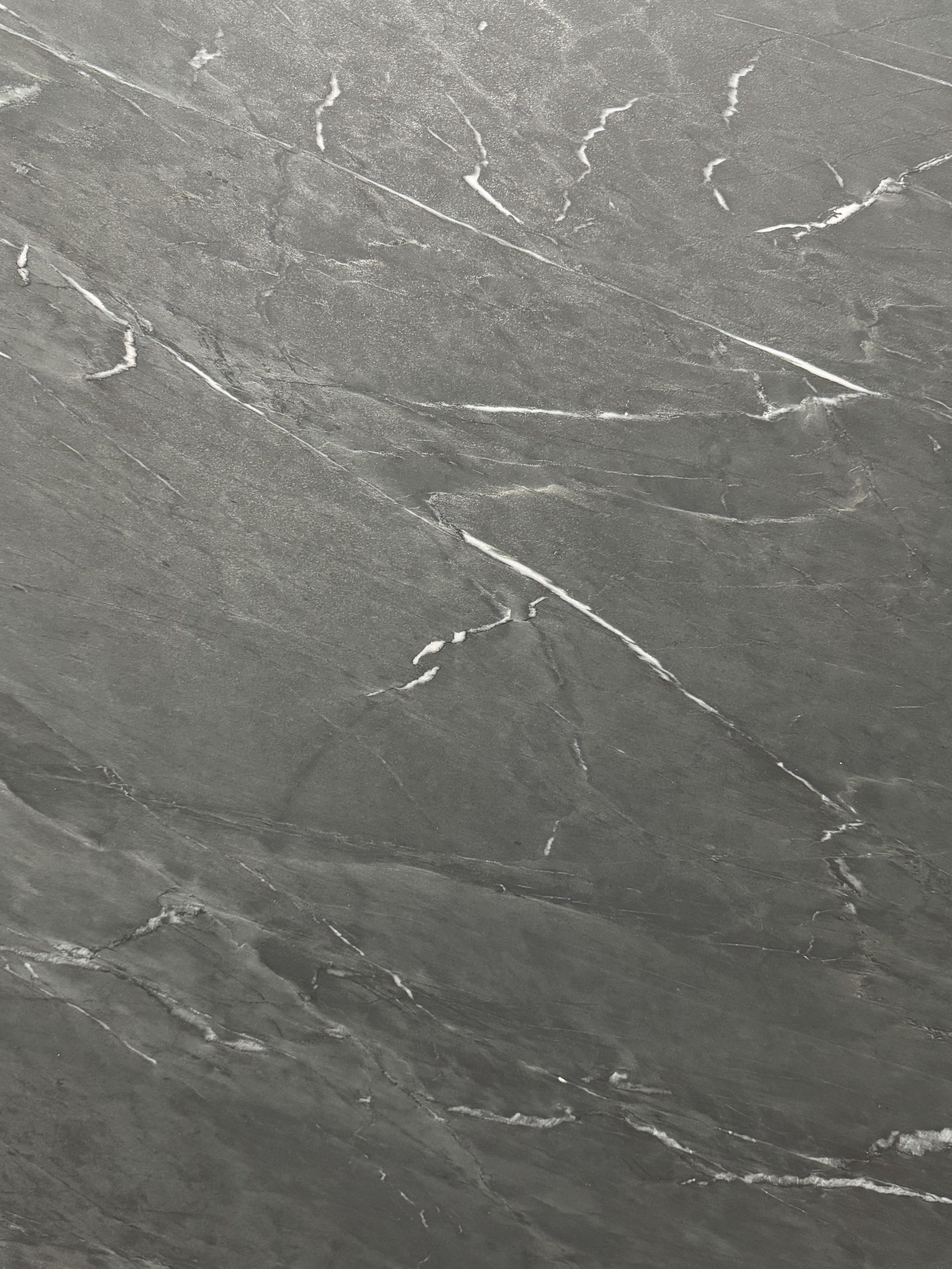 GRAPHITE BLACK SLATE: Primary Color(s): Black, White | Available Finishes: Honed | Variations: Medium