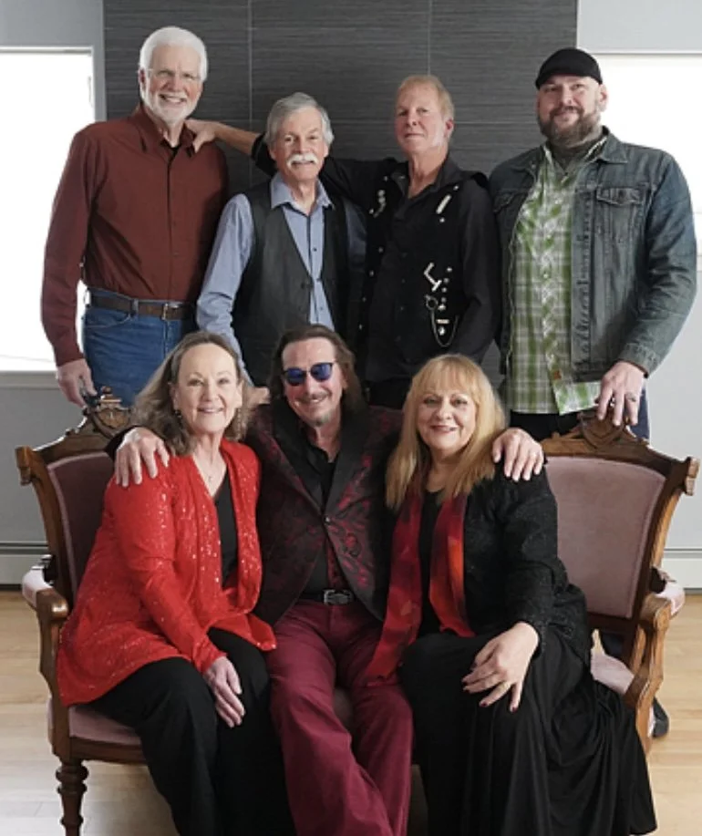 Rose and The Thorn band members: back row, left to right: Rob Browning, Dan Park, Roch Ladaiche, and Joel Bailey. Seated from left to right: Briggs Geister, Kevin Leis and Suzette DeBarros.
