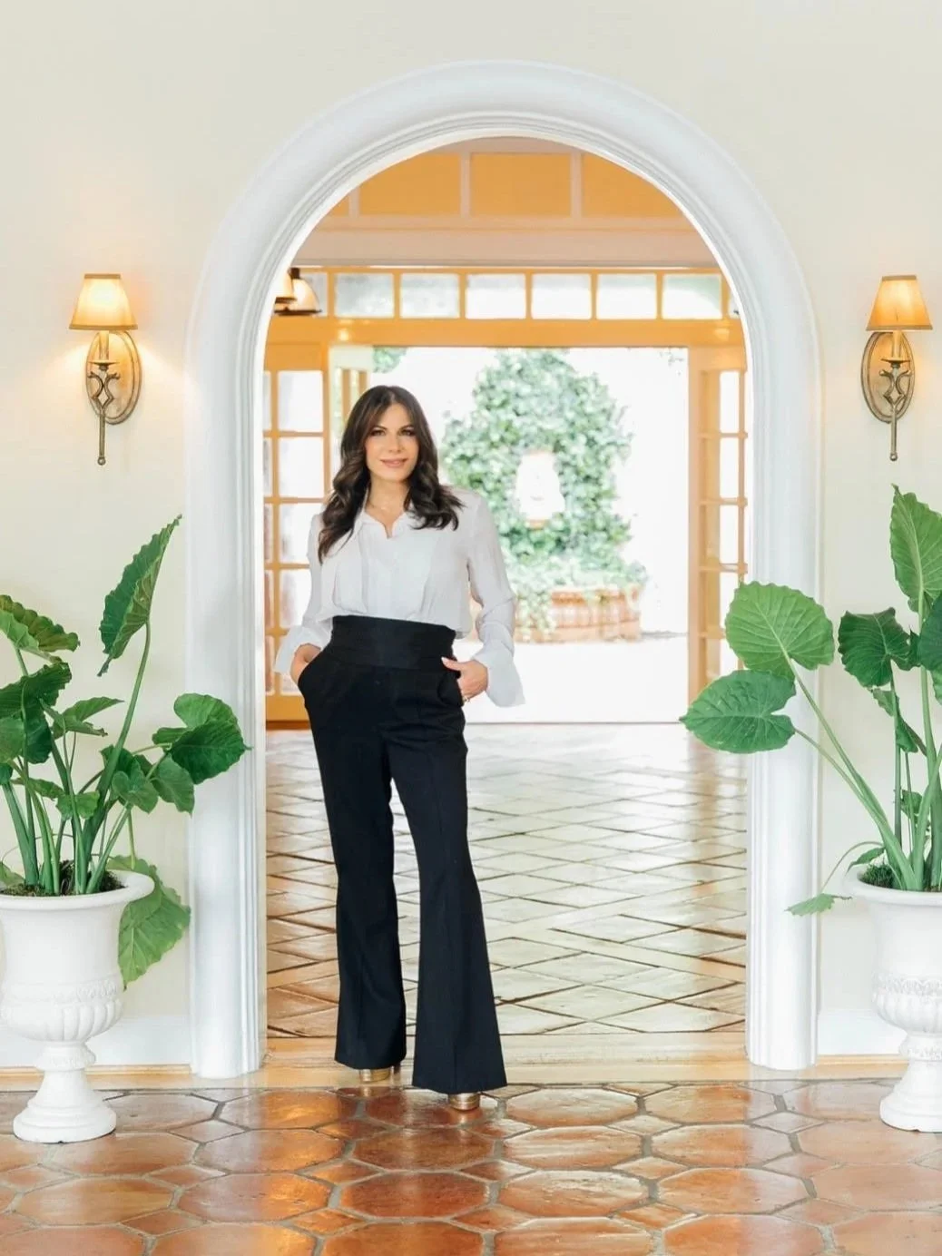 woman in front of courtyard wedding venue