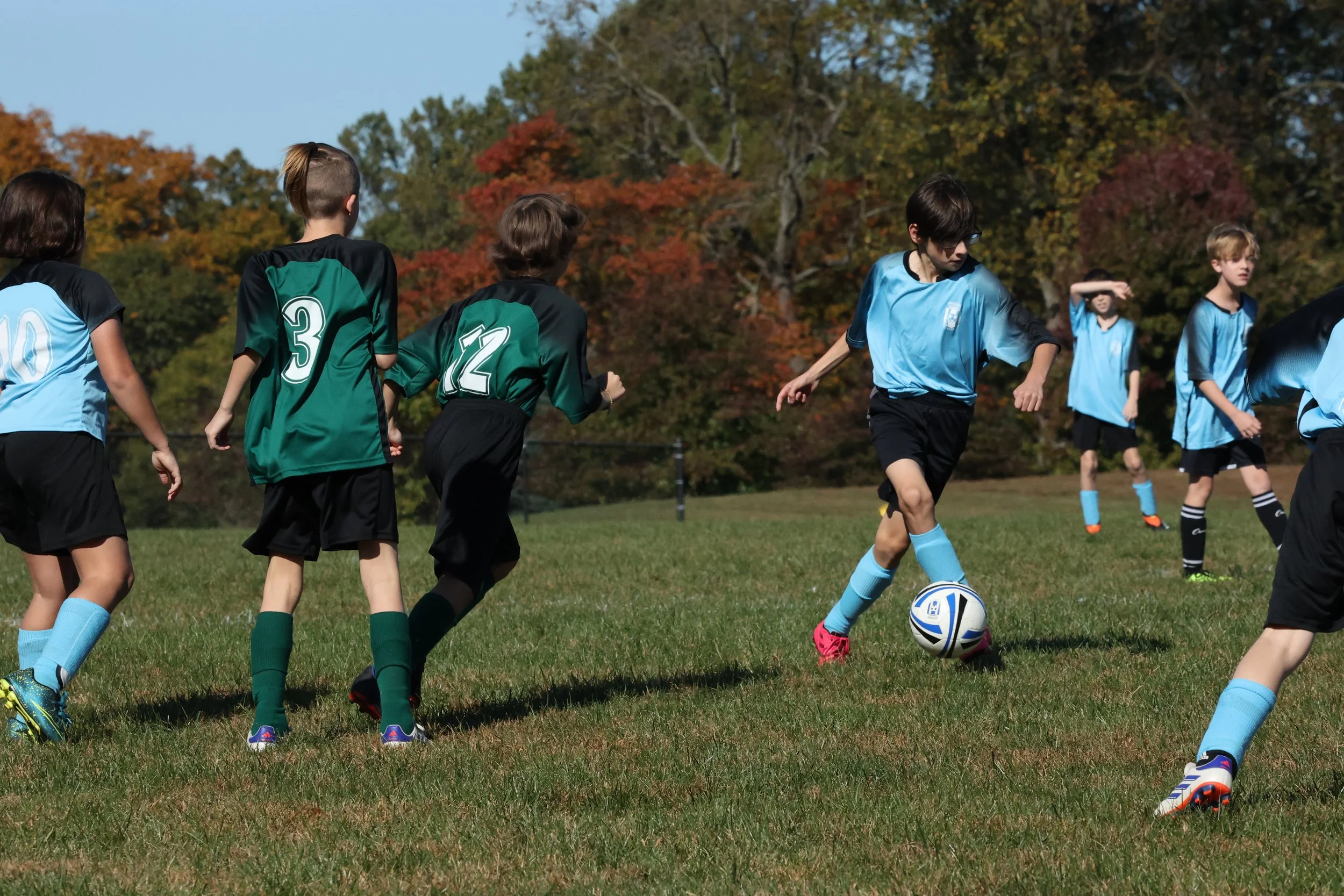  Scott #15, dribbles down the field!  