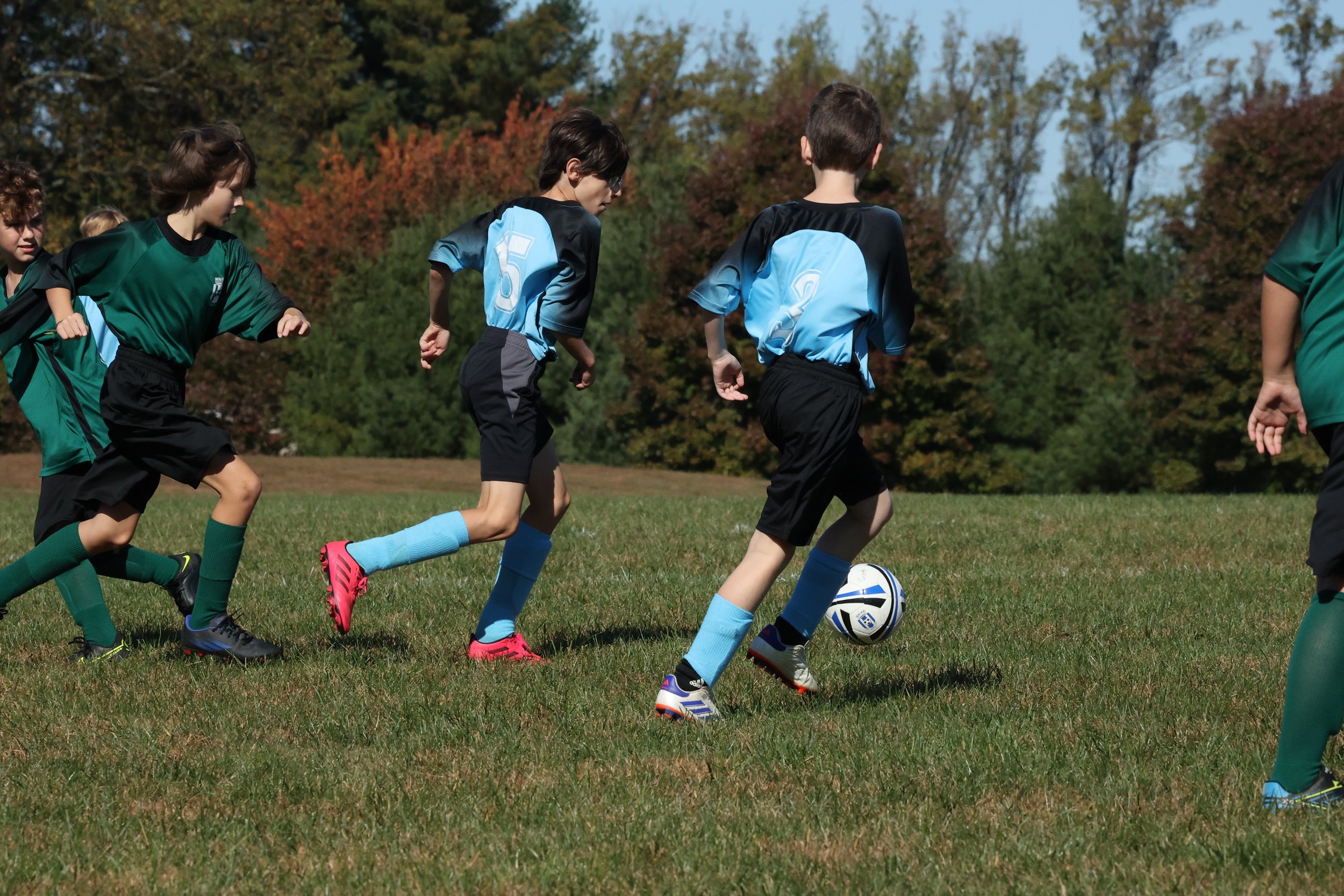  William and Scott take the ball down the field 