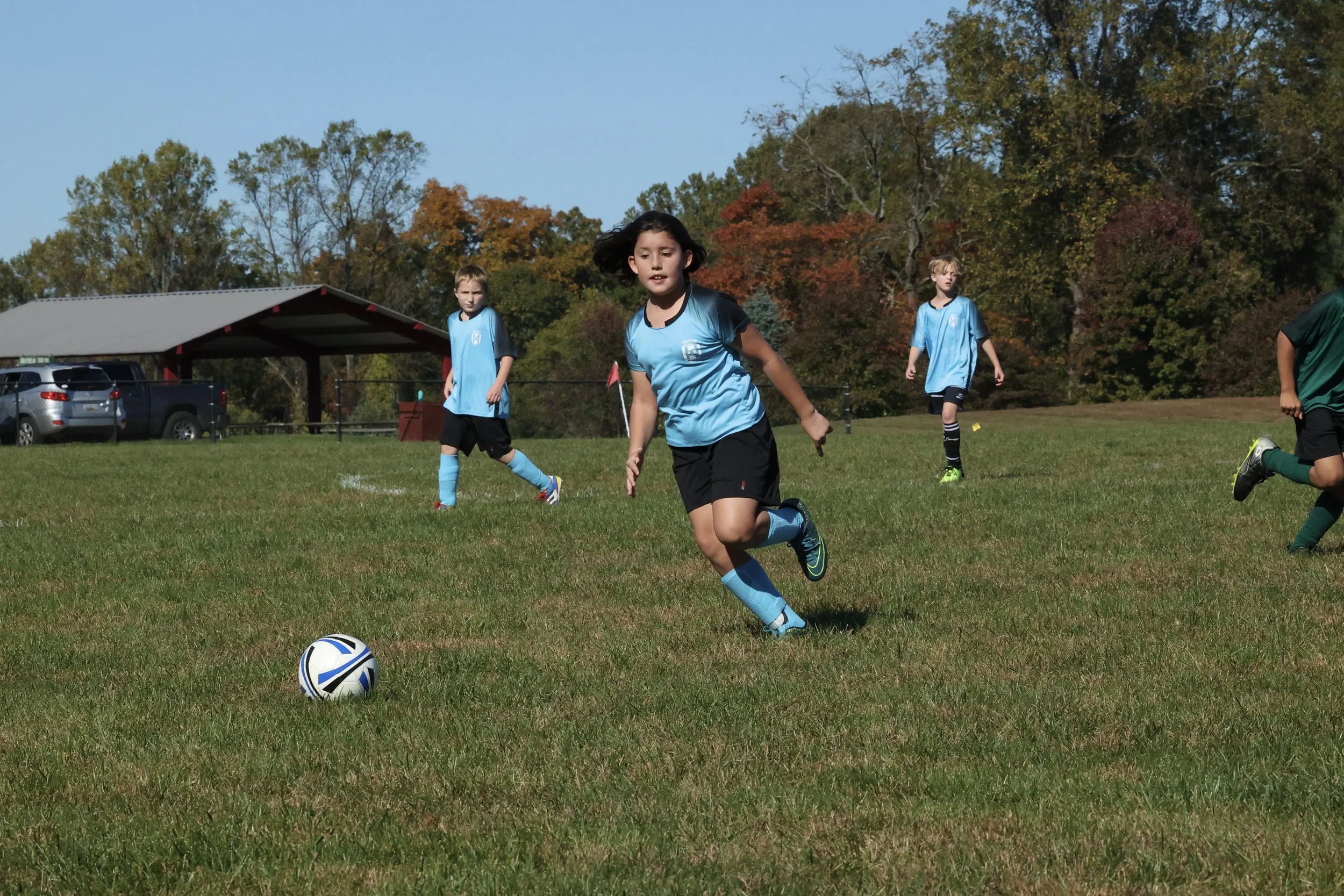  Peter kicks the ball down the field 
