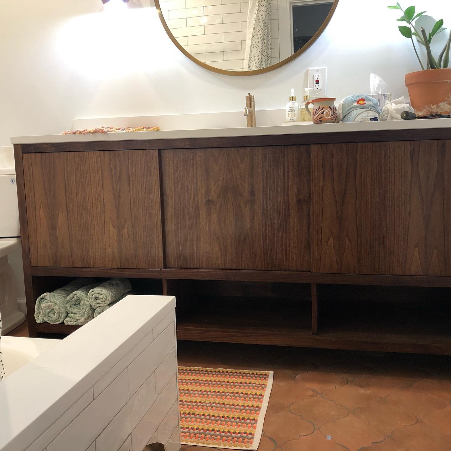 This client needed a custom sized vanity.  We made it from a mixture of walnut veneered plywood and solid faces tennoned into the plywood carcass.