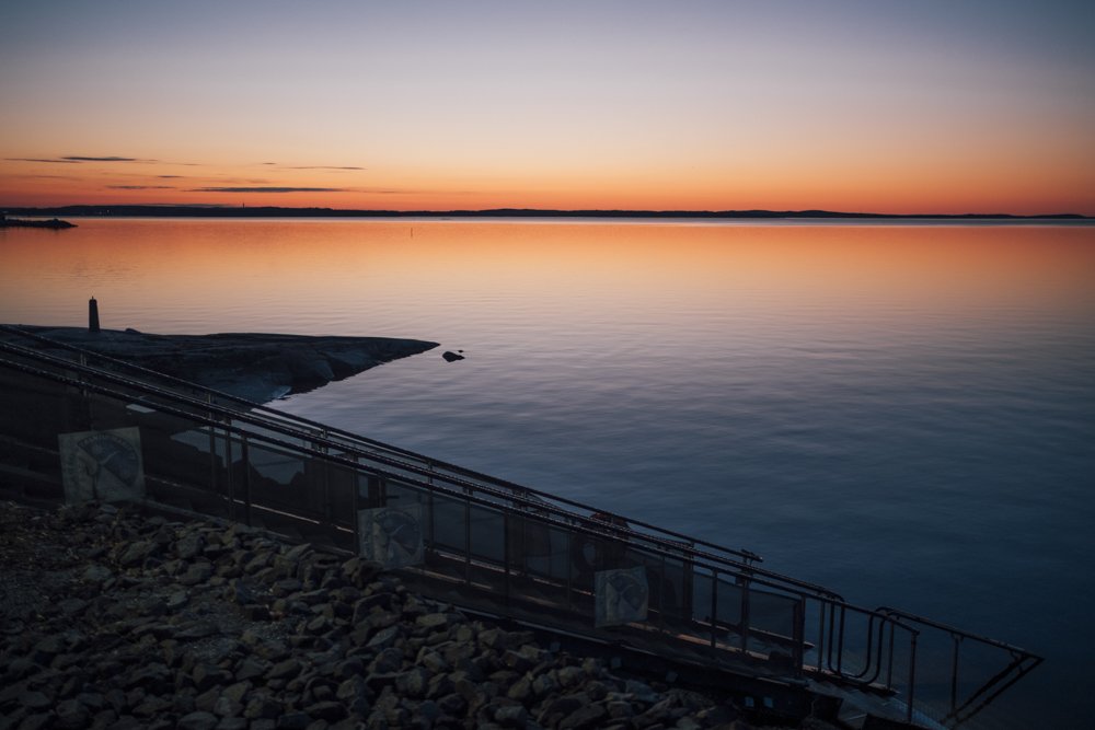 Aurinko laskee Kaupinojan saunalla