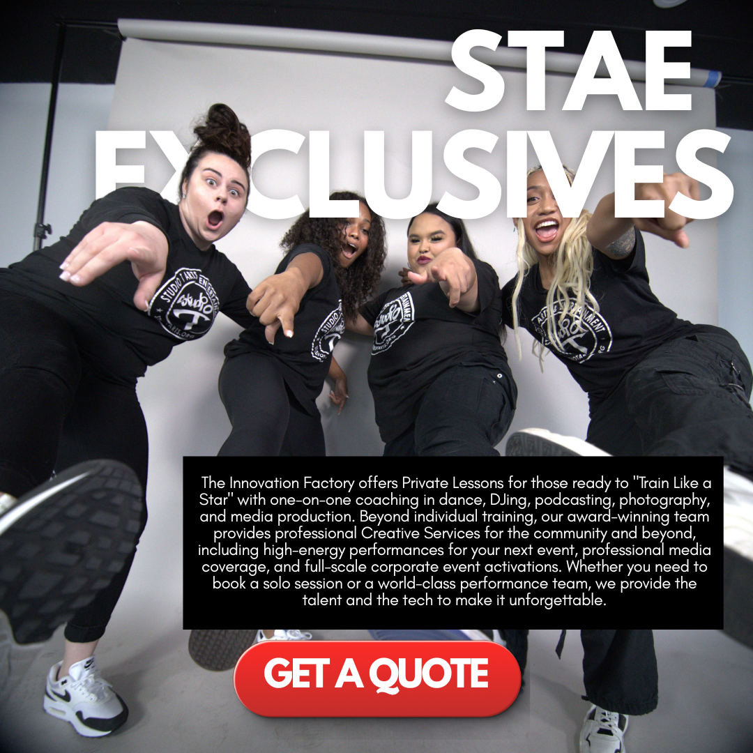 Four women in black t-shirts with a logo, posing playfully and pointing towards the camera in a photo studio with a white backdrop, promoting private lessons at the Innovation Factory for dance, DJing, podcasting, photography, and media production.