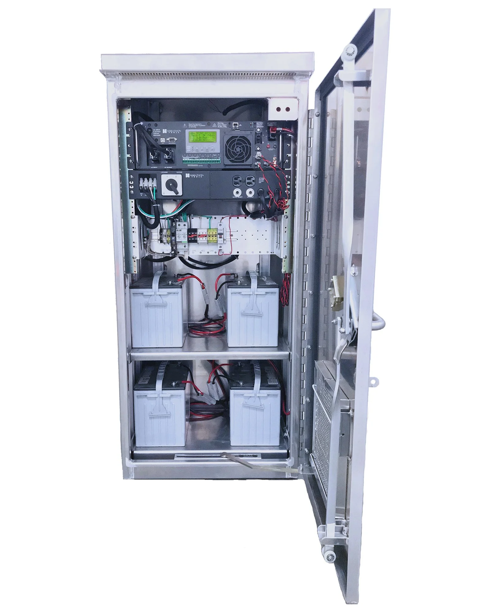 An inside view of an electrical cabinet with batteries, wiring, and electronic components.