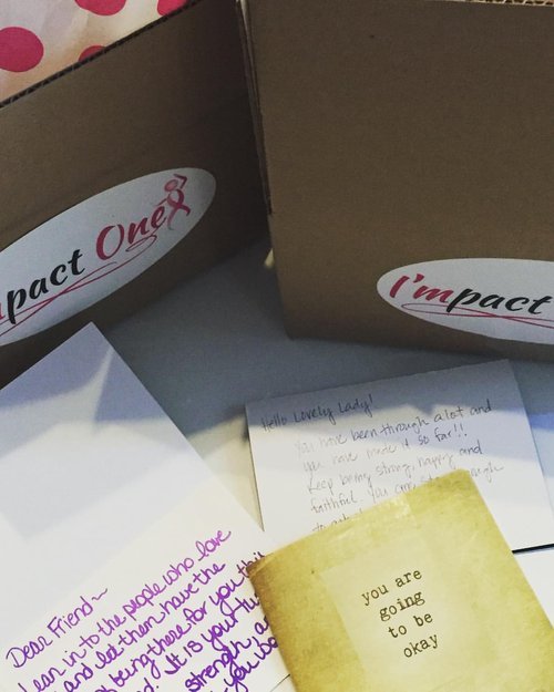 Boxes pictured alongside handwritten cards.