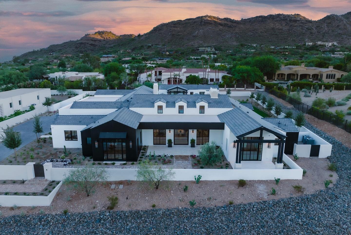 Welcome to Cholla Charm, a family sanctuary tucked on a quiet street in Mummy Mountain. It offers five bedrooms, 6.5 bathrooms, an office, a fully functional detached guest home, and 360&deg; views. We built this house to always make it feel like you
