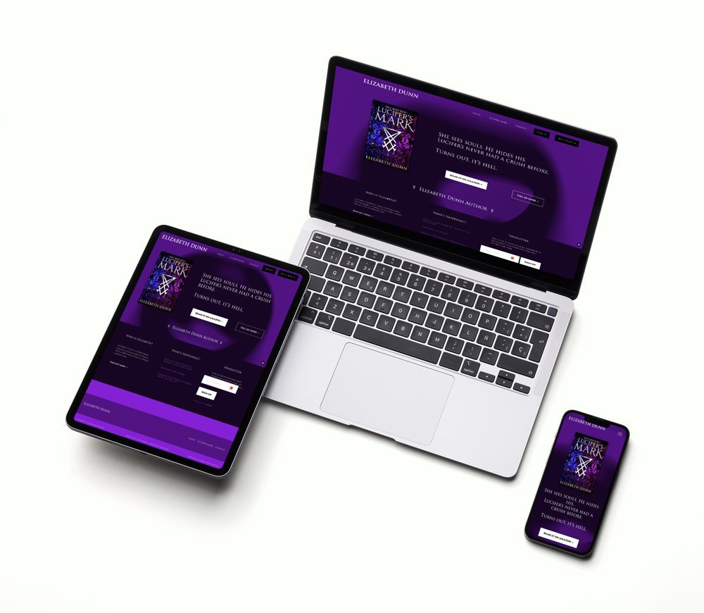 The website for author Elizabeth Dunn shown on a laptop, tablet and mobile