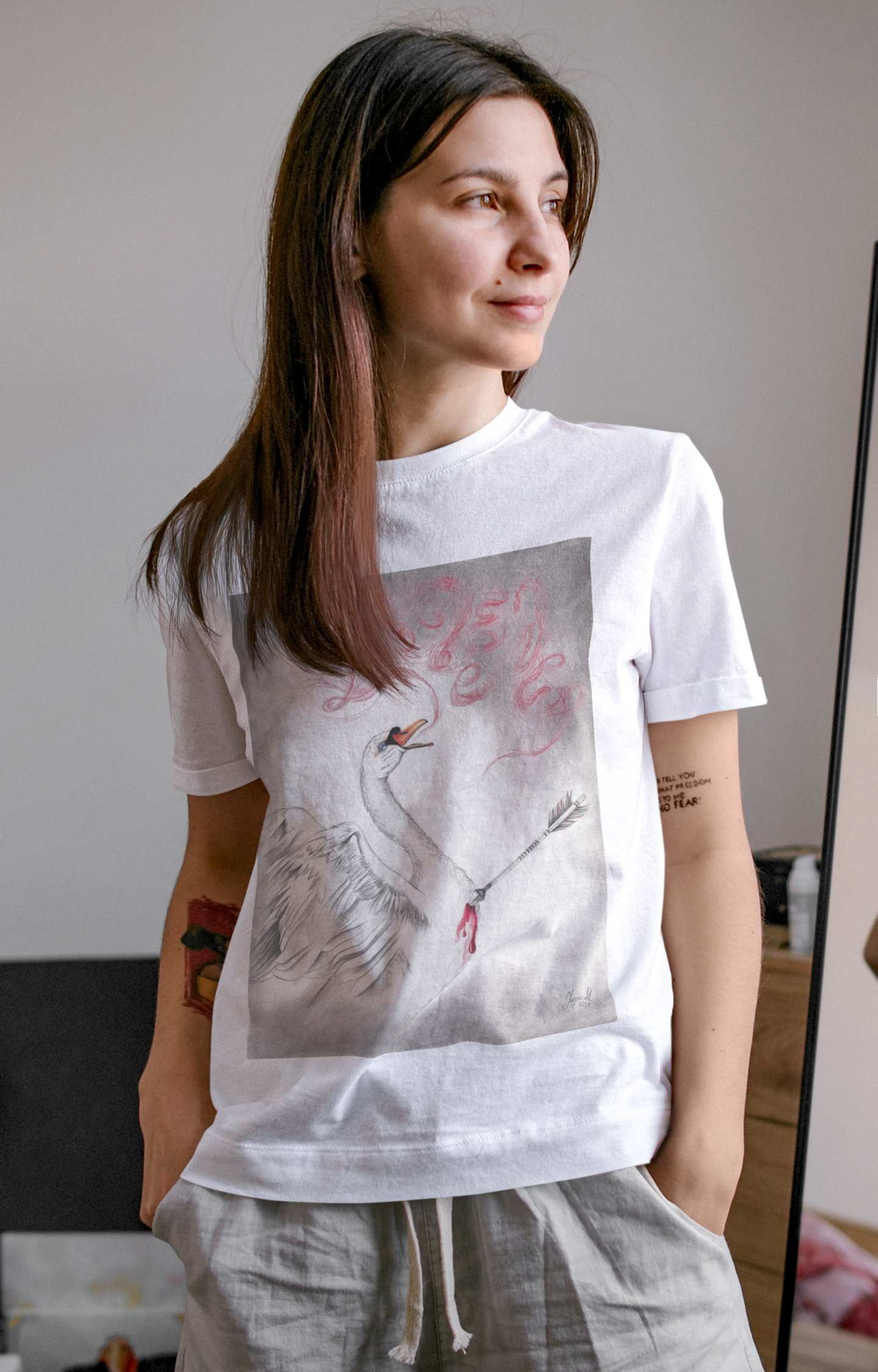 basic-t-shirt-mockup-of-a-calm-woman-with-tattoos-at-home-m1605-r-el2.png