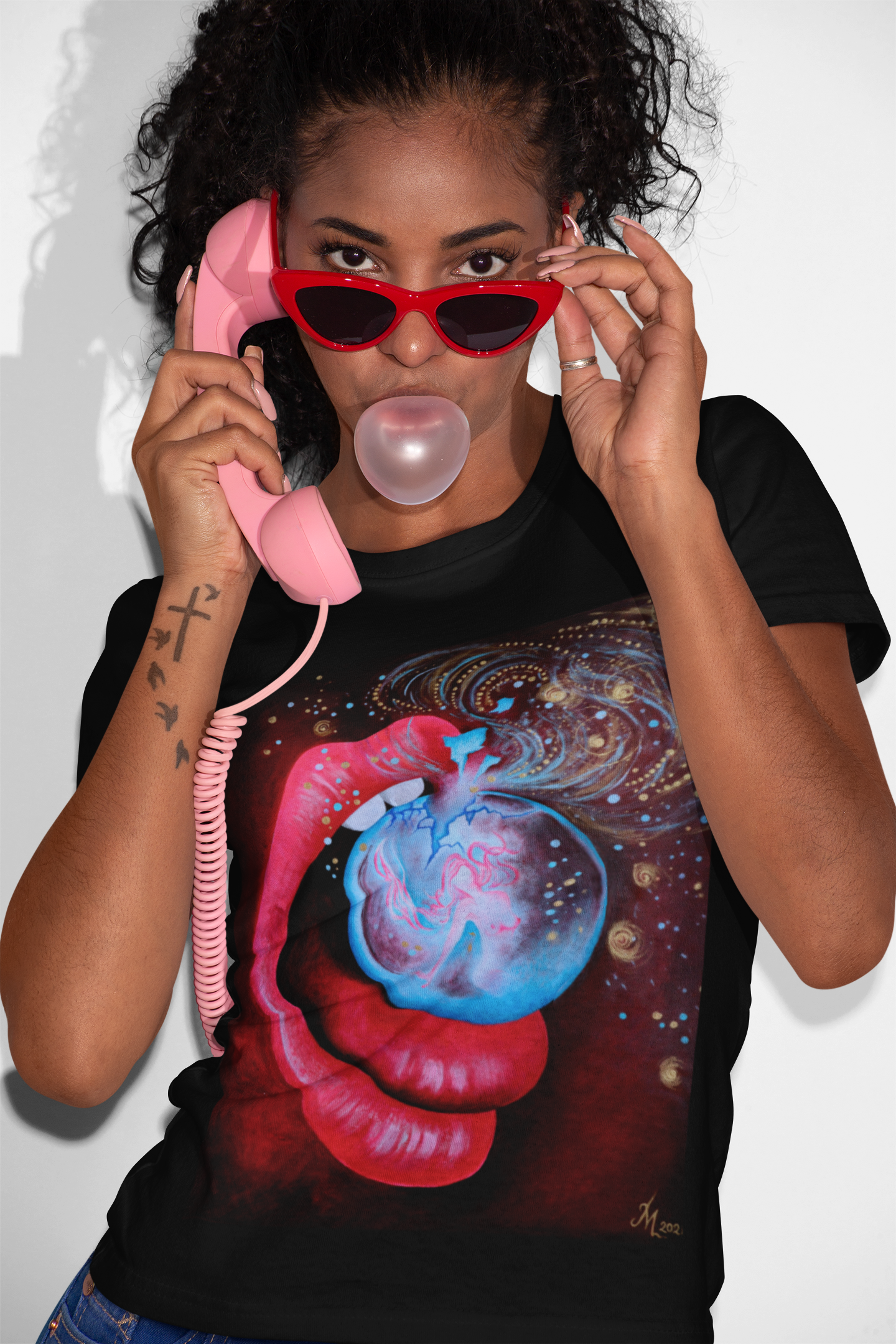 t-shirt-mockup-of-an-cool-woman-blowing-bubble-gum-21897a copy 2.png