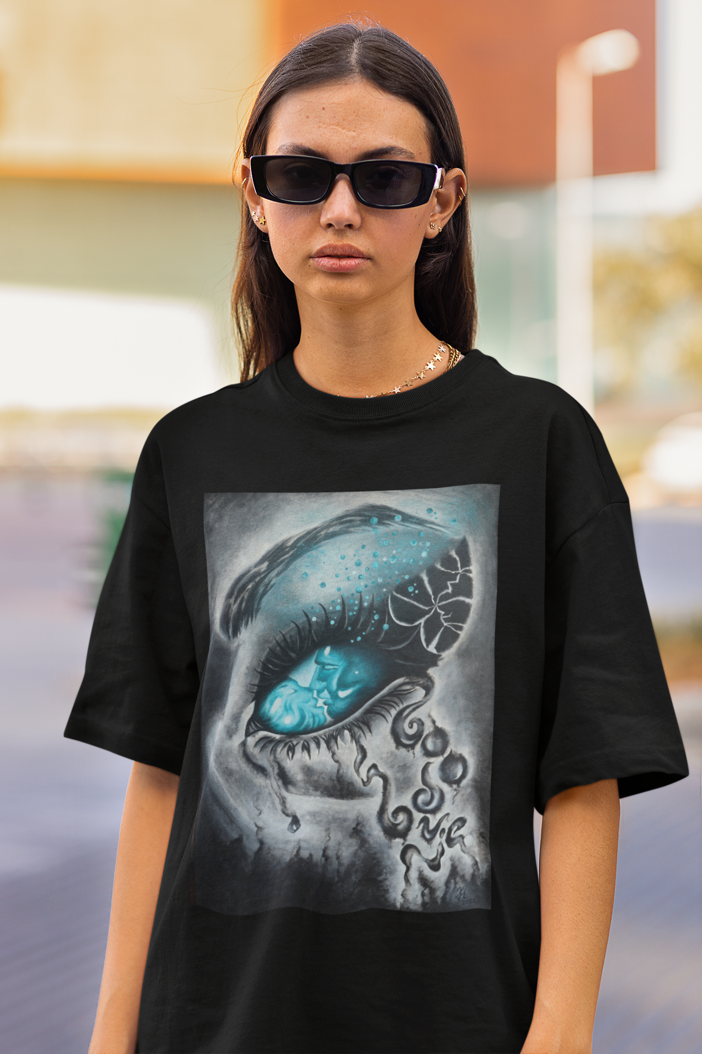 oversized-tee-mockup-of-a-serious-woman-with-sunglasses-looking-at-the-camera-m25275.png