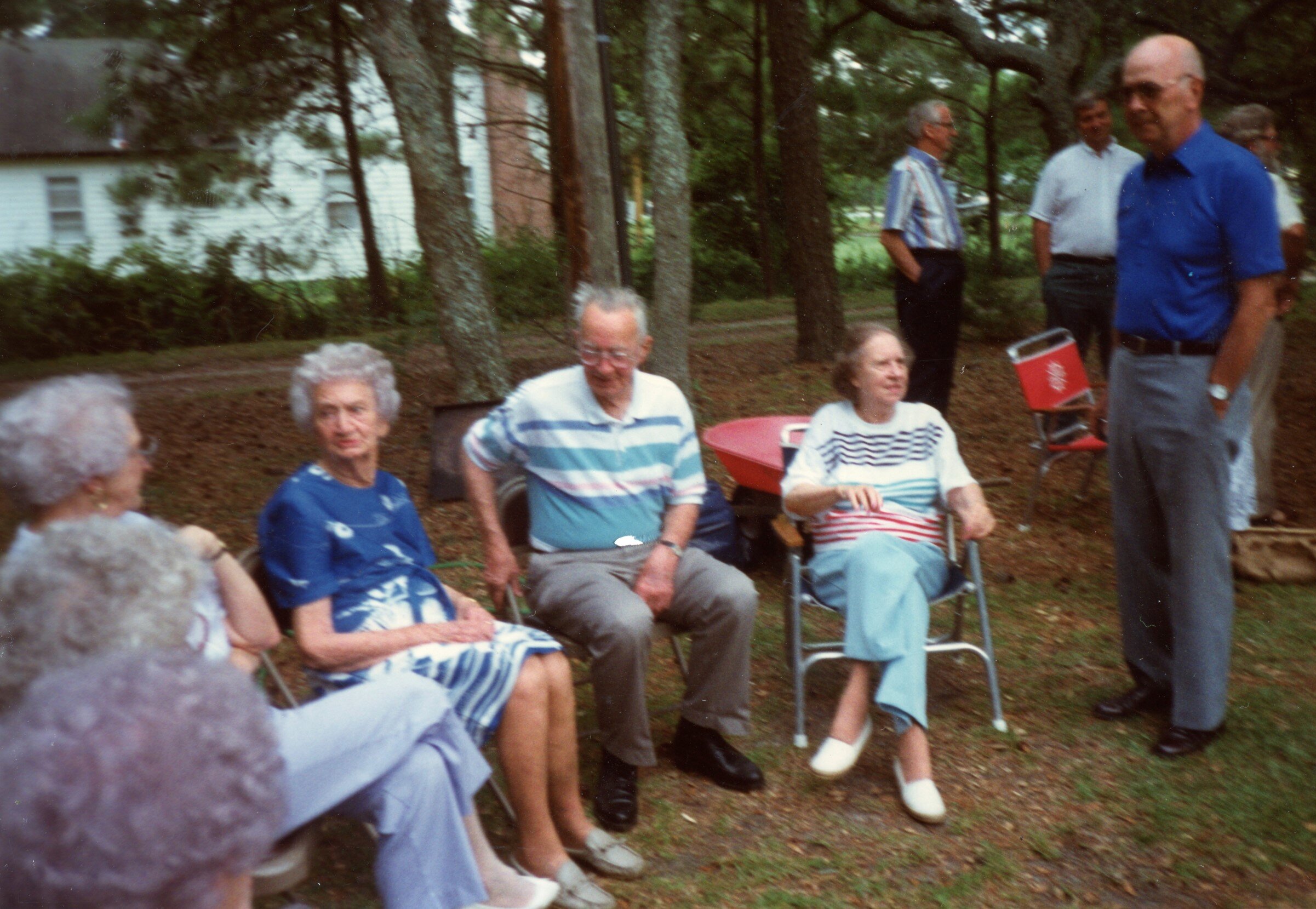  L-R: Annebelle Chadwick (Vance’s second wife–dated in college), Evelyn Chadwick Damren, Vance Chadwick, Florence Pigott (all seated) Craig Lewis standing. In the background are David Chadwick, Paul Damren 