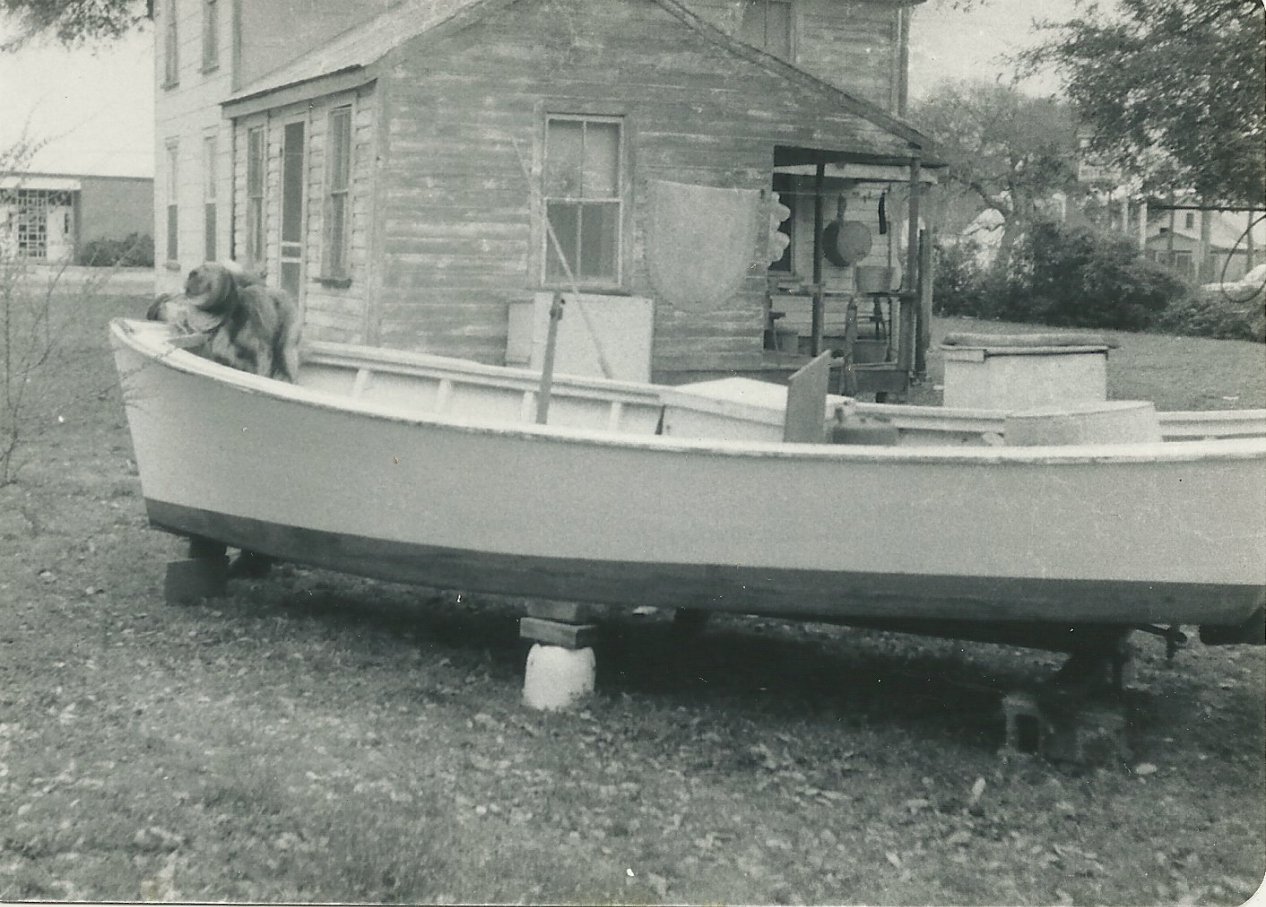 This is Lonnie Whitley's House and his Boat that Daddy Built for him. This was the First Boat Daddy ever Built. He was only about 15 and got Paid a Grand Total of $5 for her
