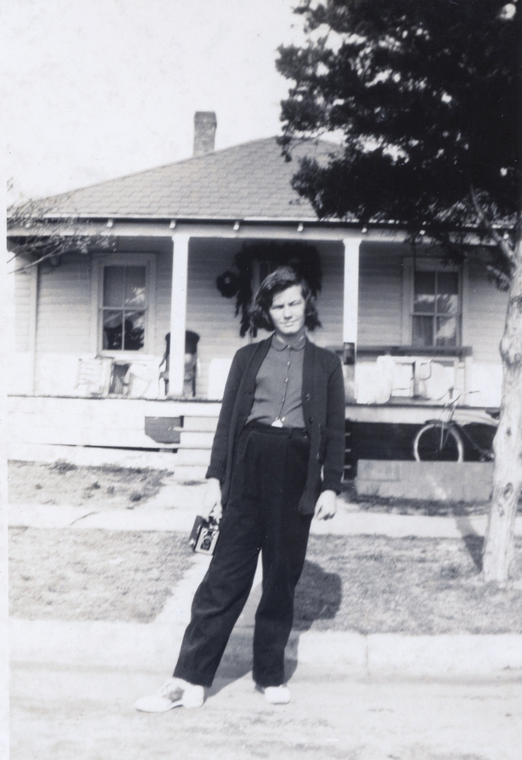 Patsy Lawrence in front of 1412 Shackleford St