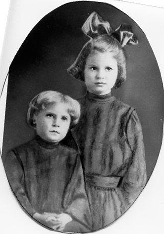 Clara Guthrie (bow) and sister Mattie, around 1915 at Oxford Orphanage