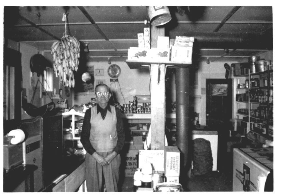 John Samuel Parker Sr. in his store on S 11th street, behind his house at 1013 Evans St.