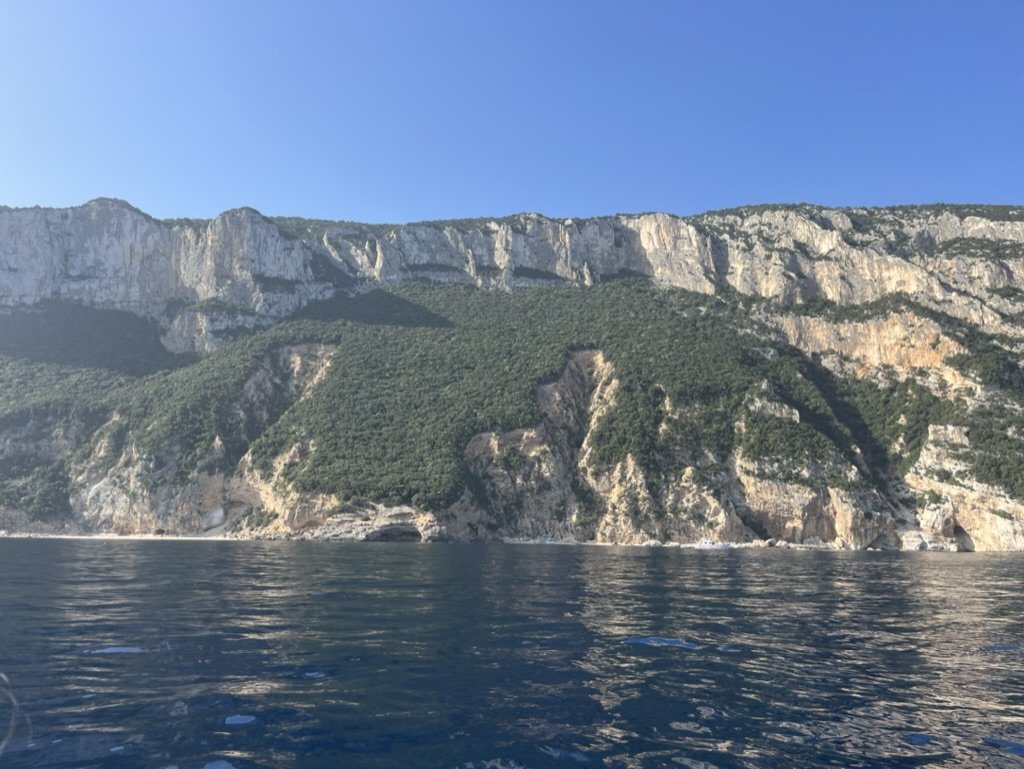 The limestone cliffs that line the coast near Baunei