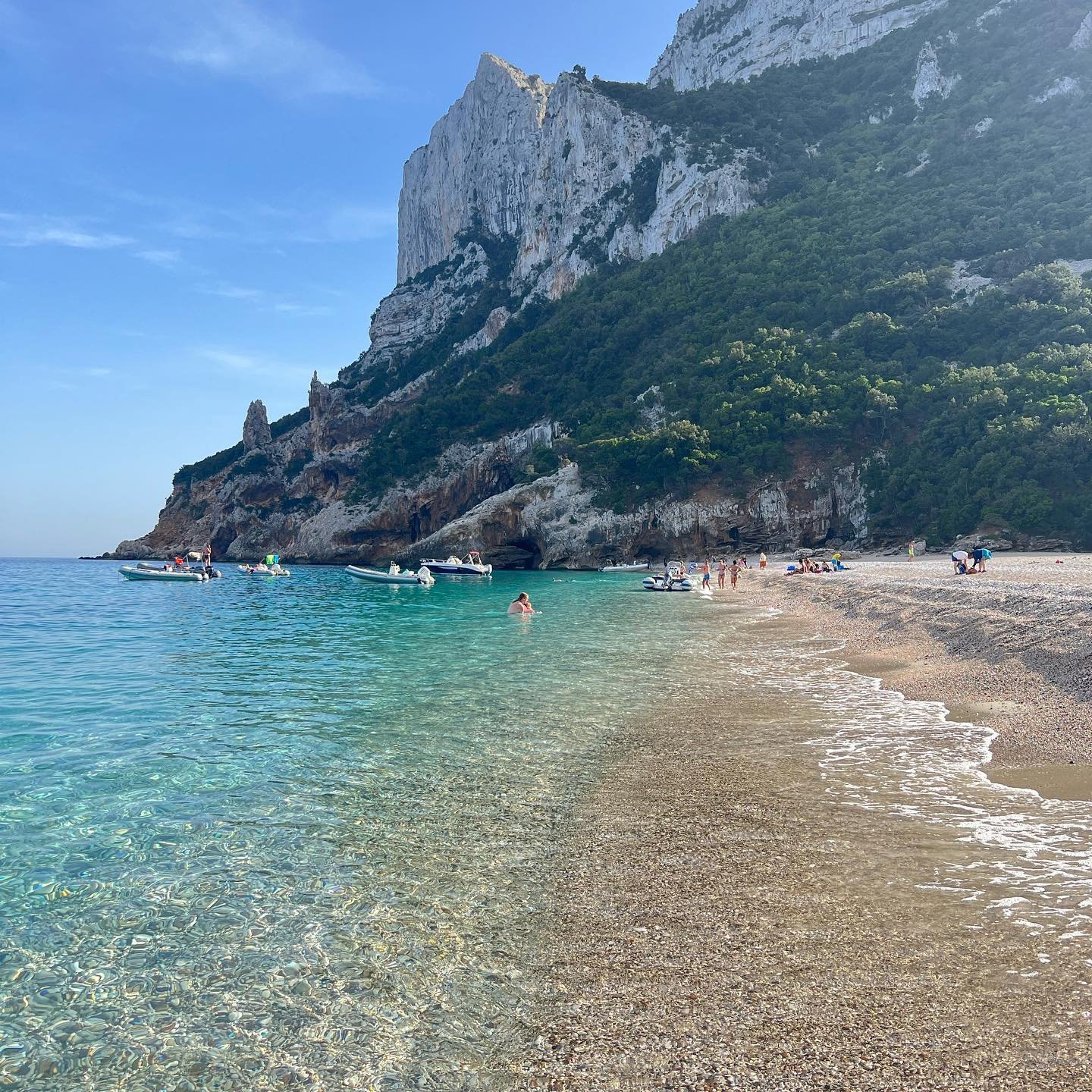 A secluded beach and cliffs in Sardinia