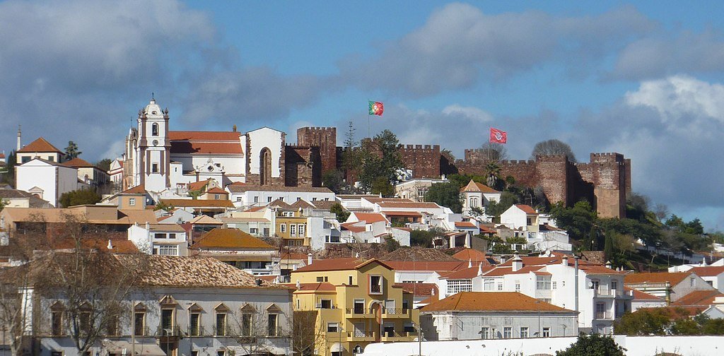 The town of Silves, up on the hill, with its principal cathedral and fortified castle rising above the rest of the town