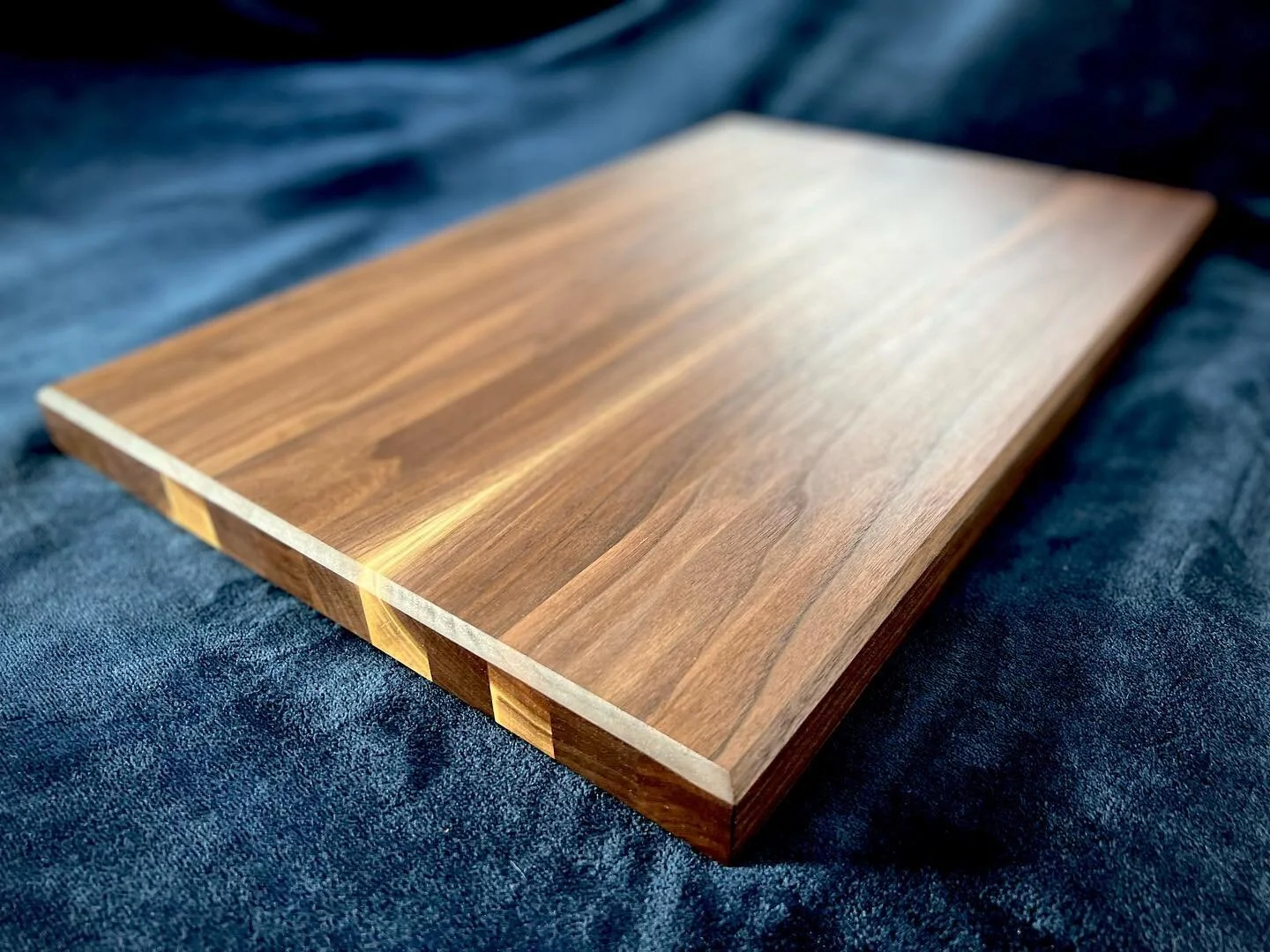 A colleague had a walnut tree taken down a couple years ago, and was able to hang on to a couple pieces. He asked about doing a large butcher block style cutting board. This beast finished at just under 24x16 inches and she&rsquo;s a beaut. Incorpora