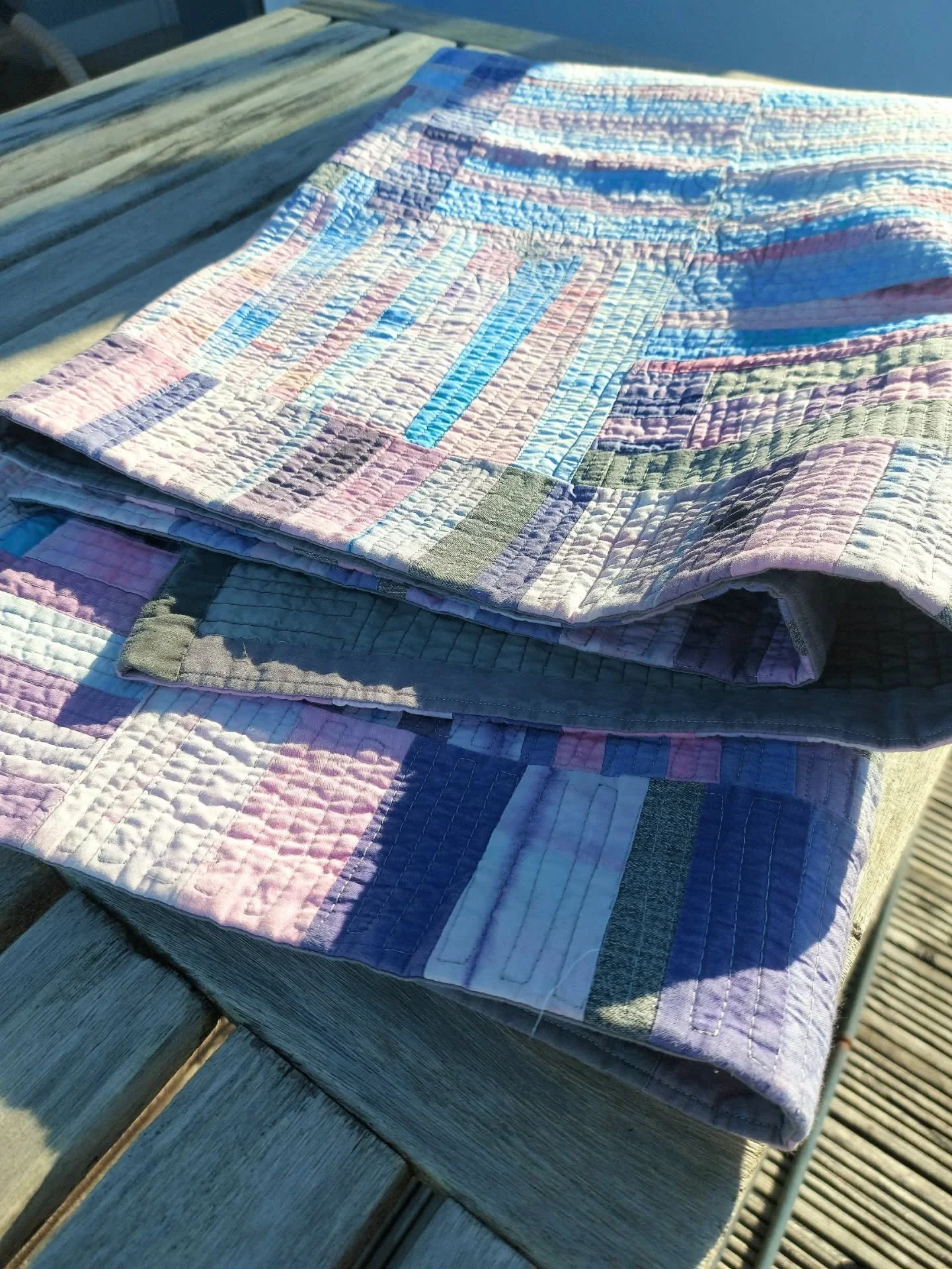 As I seem to be knee-deep in pinky scraps at the moment, I thought I would share this quilt that I made back in 2010. When I first began painting fabric, I picked up some end of the range fabric paints from France, which were manily in the sweet, sug