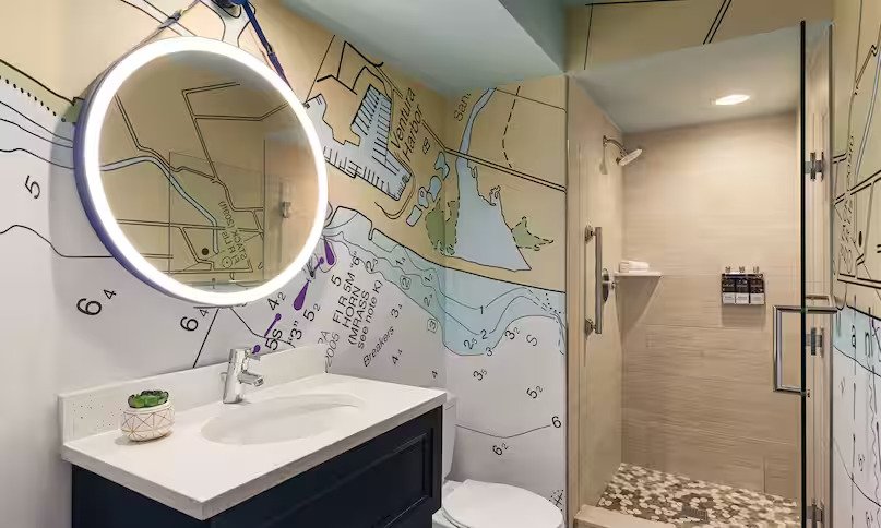 sbazd-standard-suite-bathroom-shower.jpg