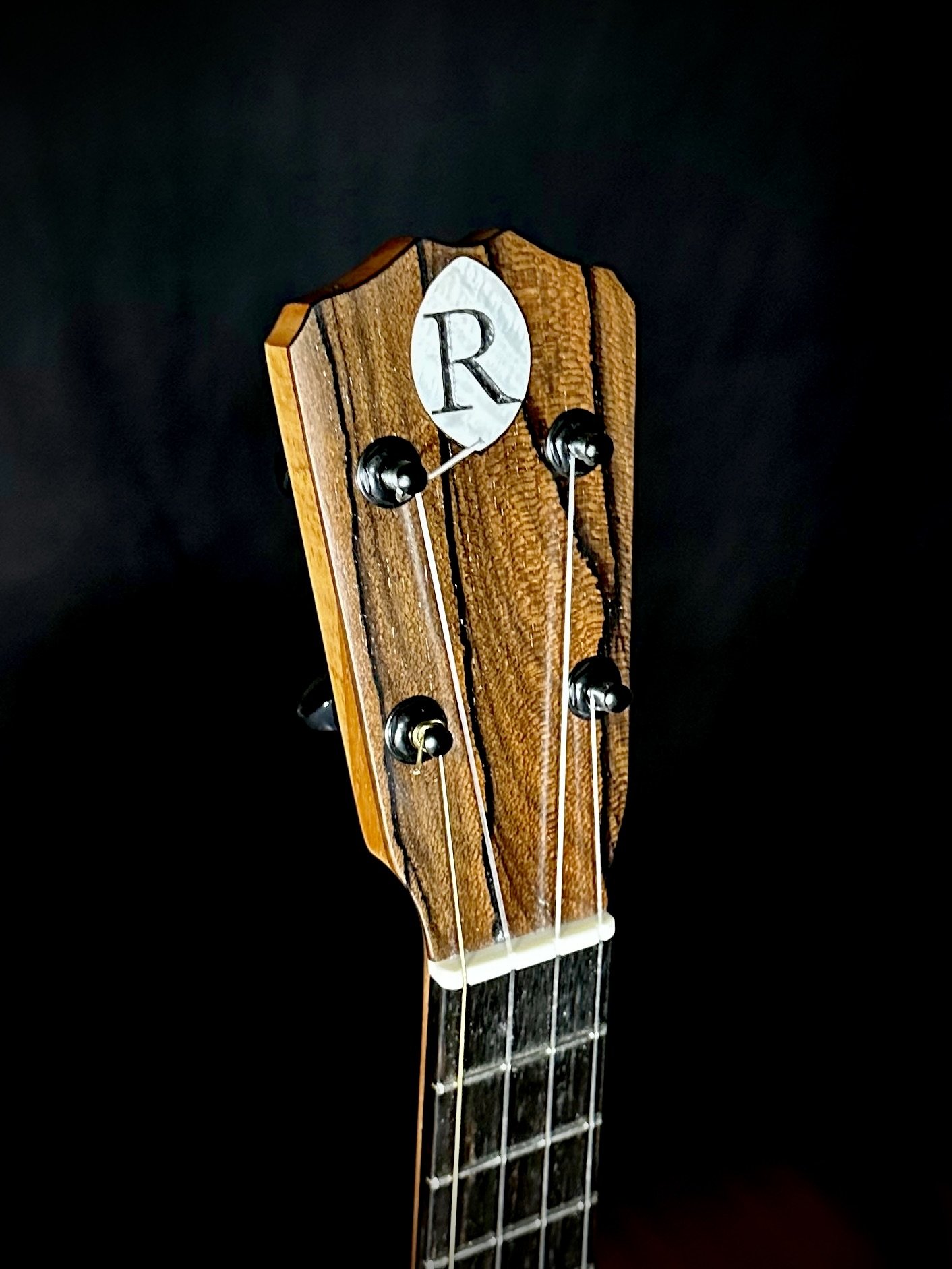 243 Mahogany Pyro Tenor Ukulele head.jpeg