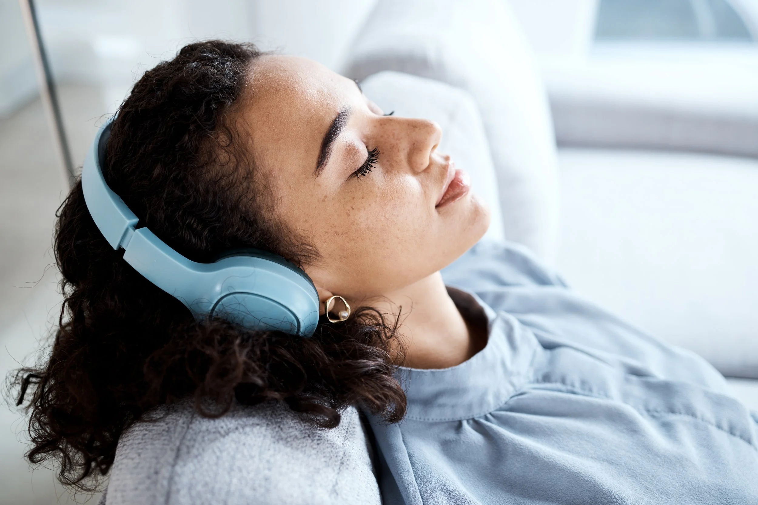 face-woman-and-headphones-for-listening-to-music-2023-02-25-00-46-37-utc.jpg