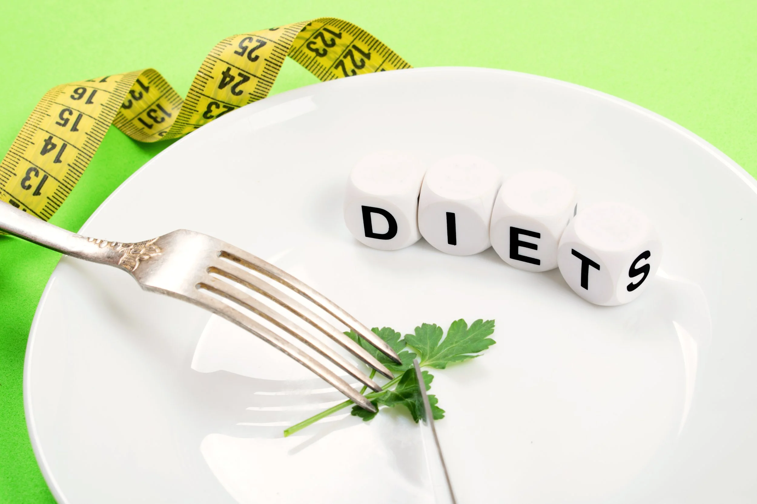 small-portion-of-food-on-big-plate-close-up-small-2021-08-30-16-36-17-utc.jpg