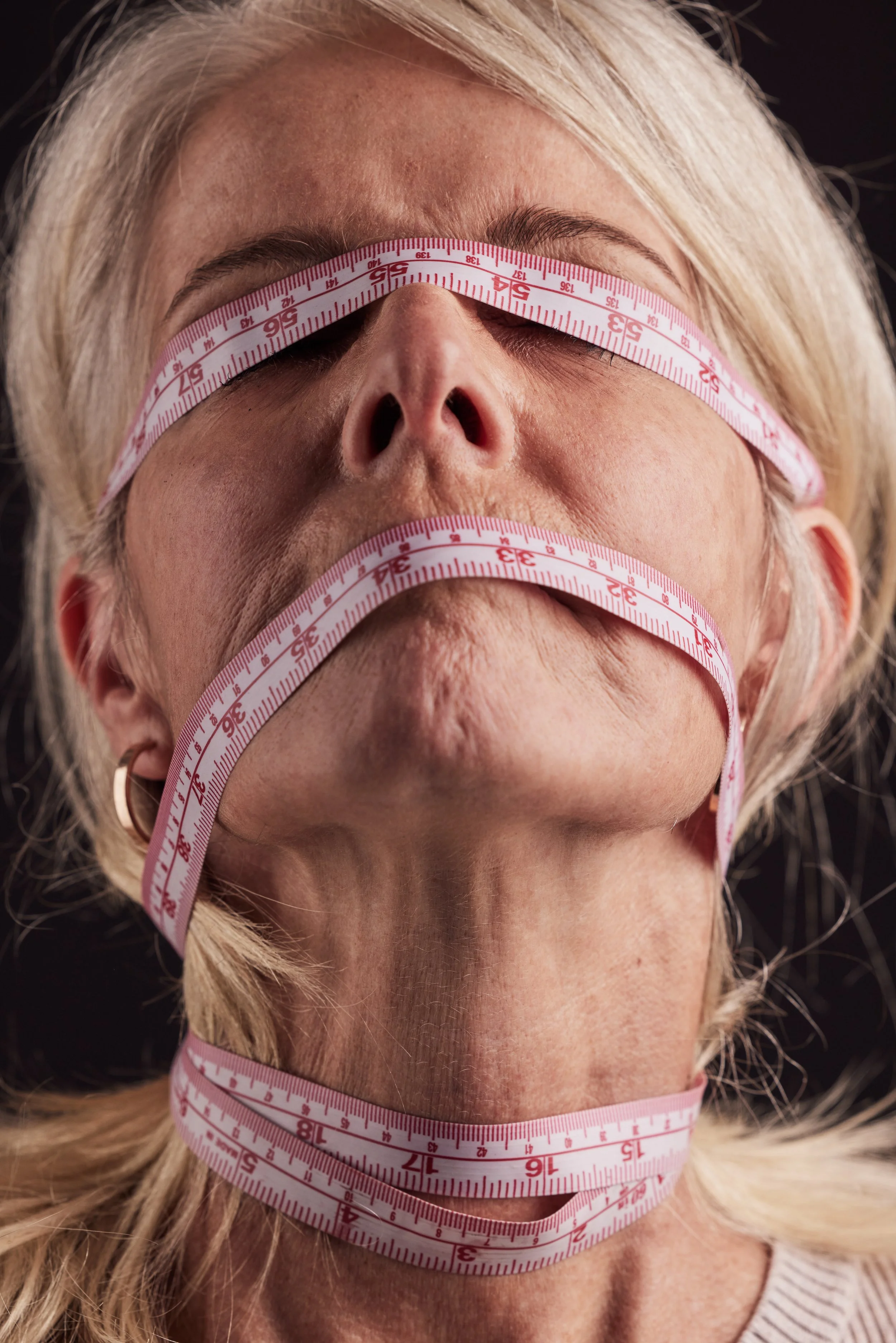 face-tape-measure-and-woman-with-anorexia-eating-2023-01-06-17-05-30-utc.jpg