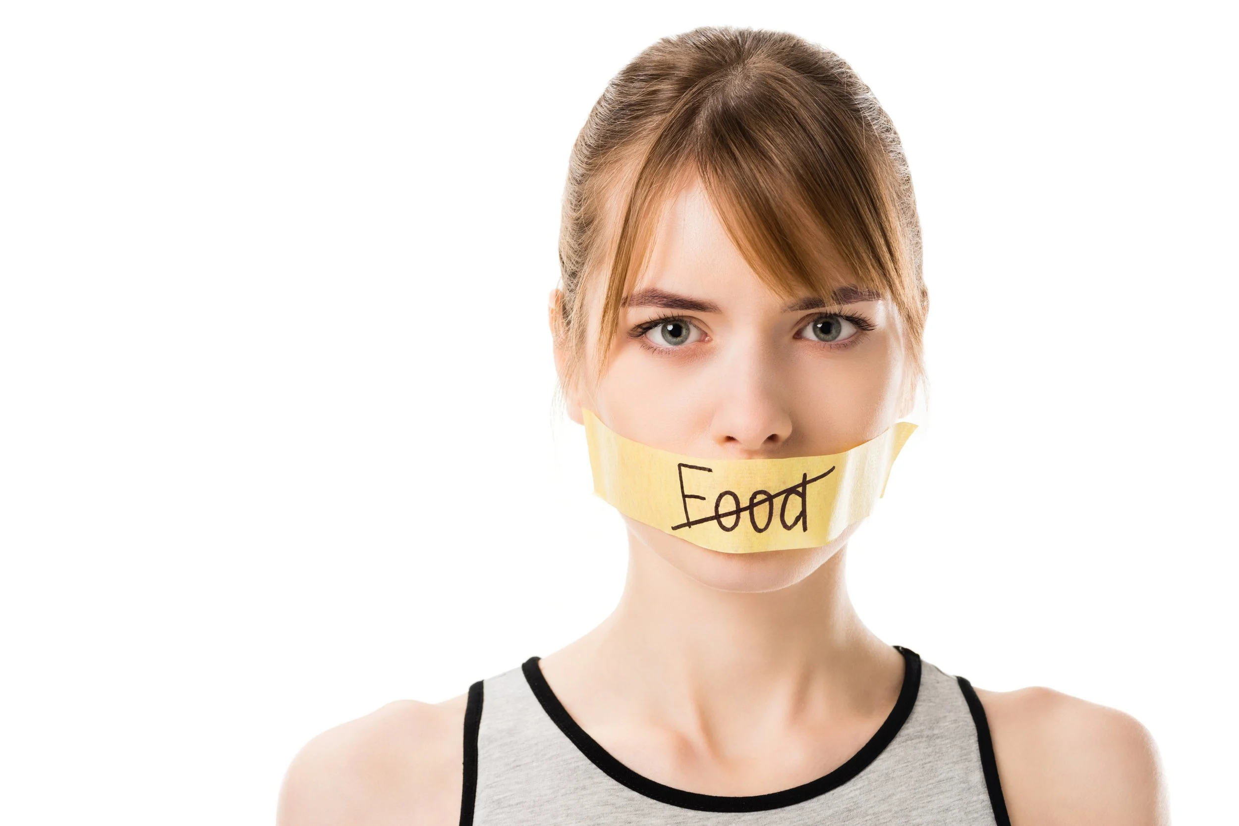 woman-with-stiker-with-striked-through-word-food-c-2022-11-18-02-28-53-utc.jpg