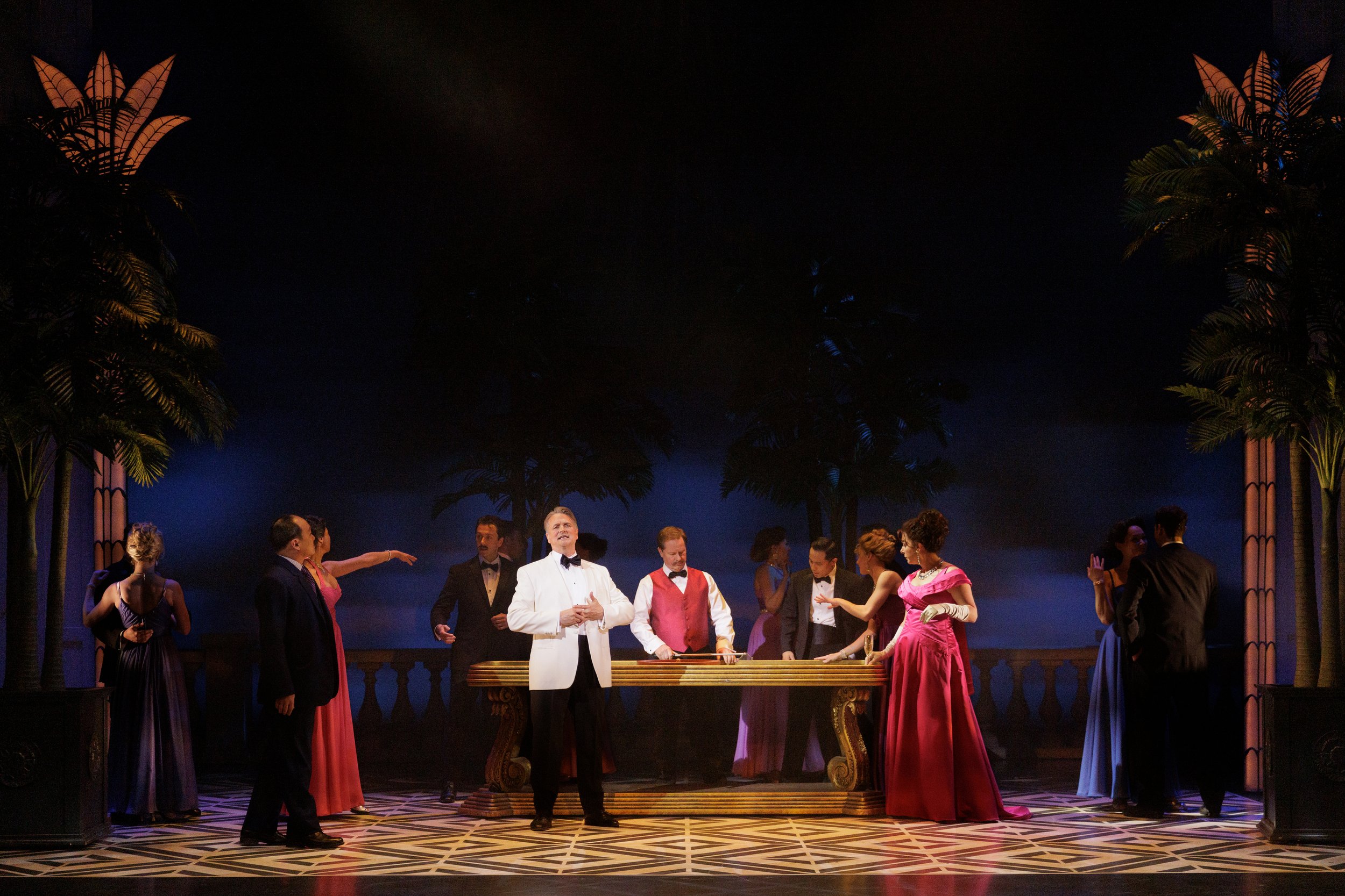 Jonathan Goad as Lawrence Jameson (centre) with members of the company in Dirty Rotten Scoundrels. Stratford Festival 2025. Photo: David Hou.