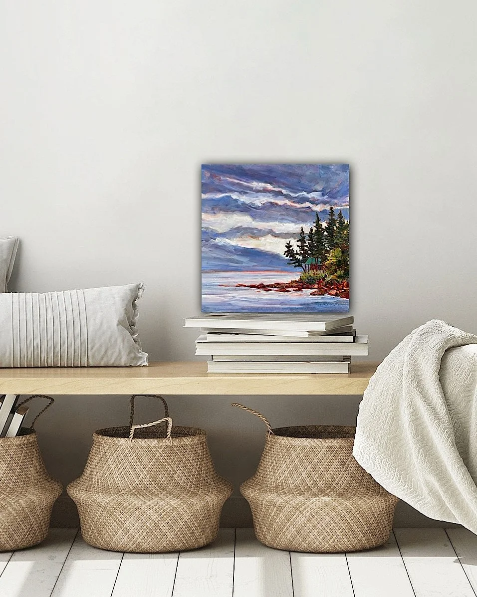 Do you get creative with where paintings go? They don&rsquo;t always have to go up on a bog wall. I love to &ldquo;sit&rdquo; paintings sometimes on a chair, a shelf or a pile of books!  It&rsquo;s just important to always put them closer to a group 