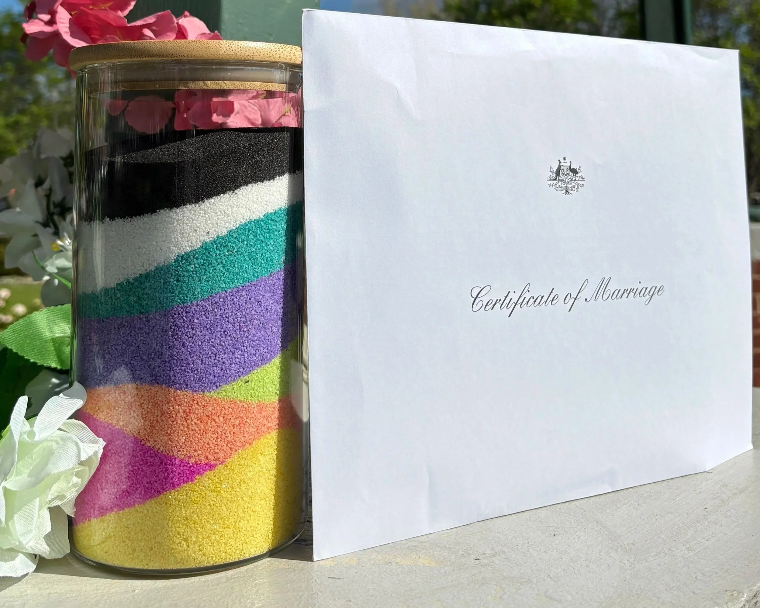 When two large families merge it's only fitting to take home a memory of the occasion, a Sand Blending Ceremony is the perfect takehome. 