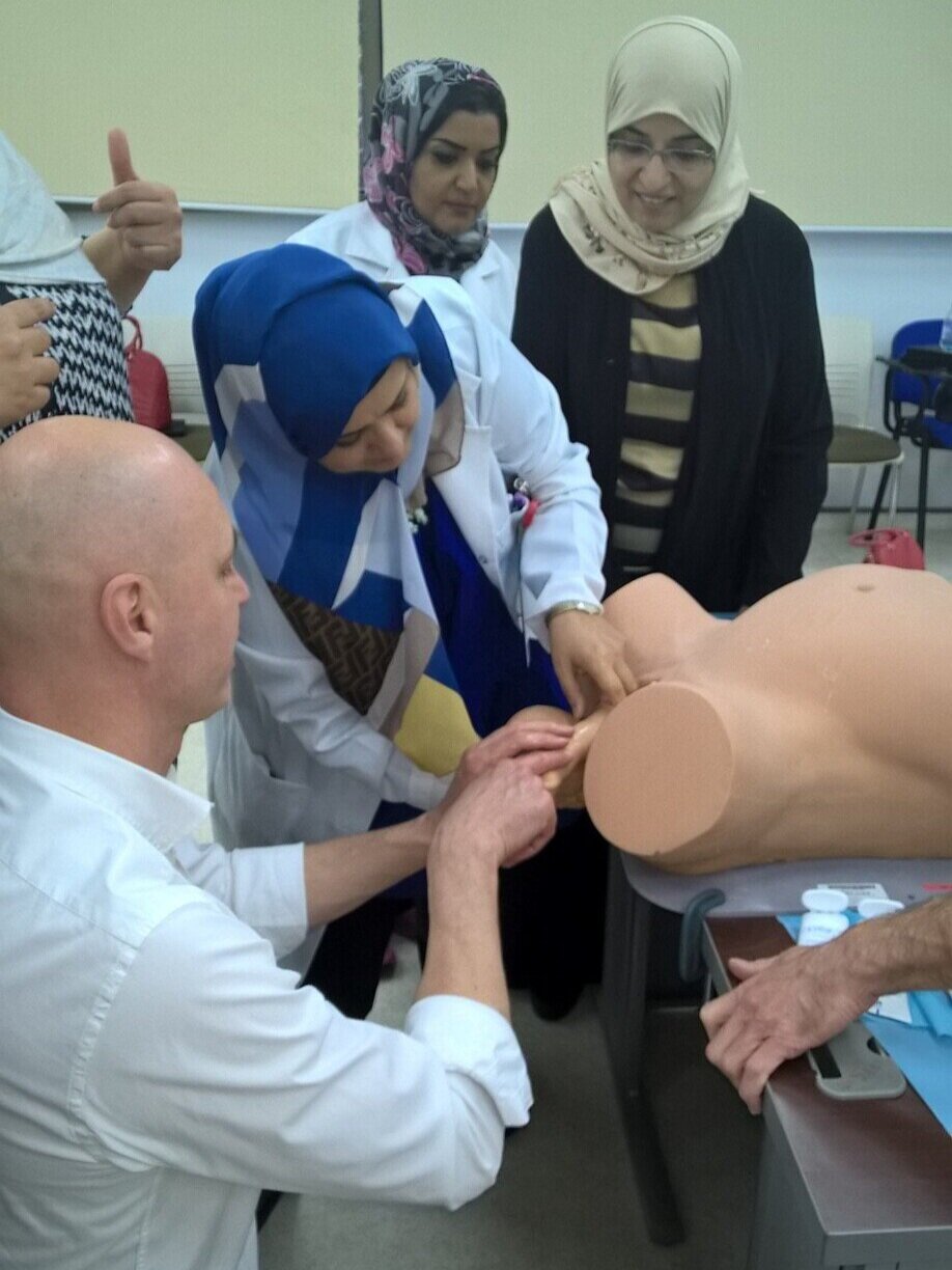 2016 - PEERS workshop in Bahrain; prof. Kališ checks how the perineum protection technique is provided