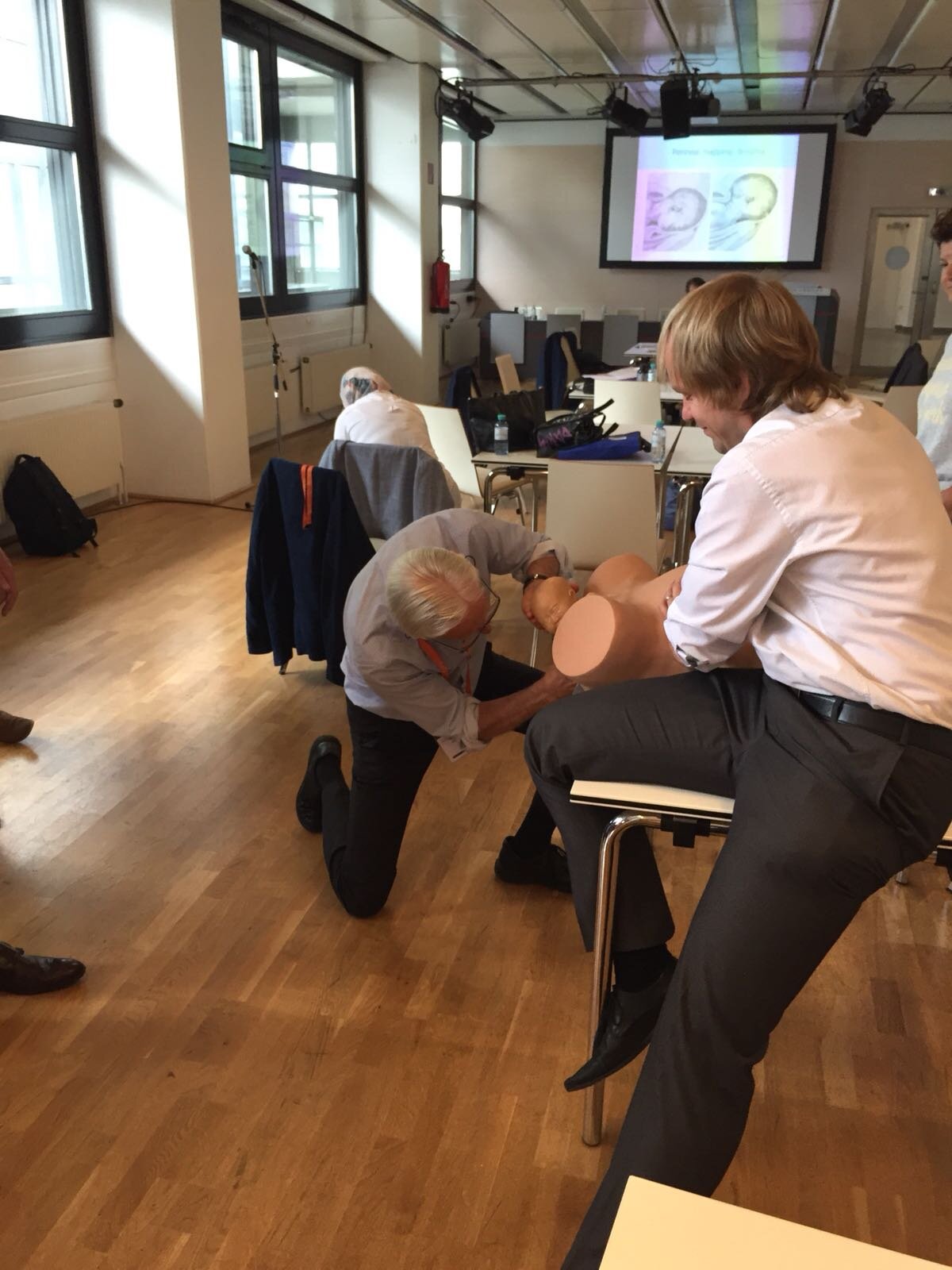 2018 - PEERS workshop in Vienna, doc. Rušavý supervises the technique of protecting perineum during childbirth