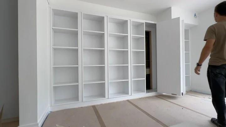 Everyone loves a secret door!🚪Even better when there are two. 
One of these cabinet doors opens to provide additional storage and the other allows access to utilities. Function meets aesthetic. @murphydoor 
#custom #customcabinets #customcabinetry #