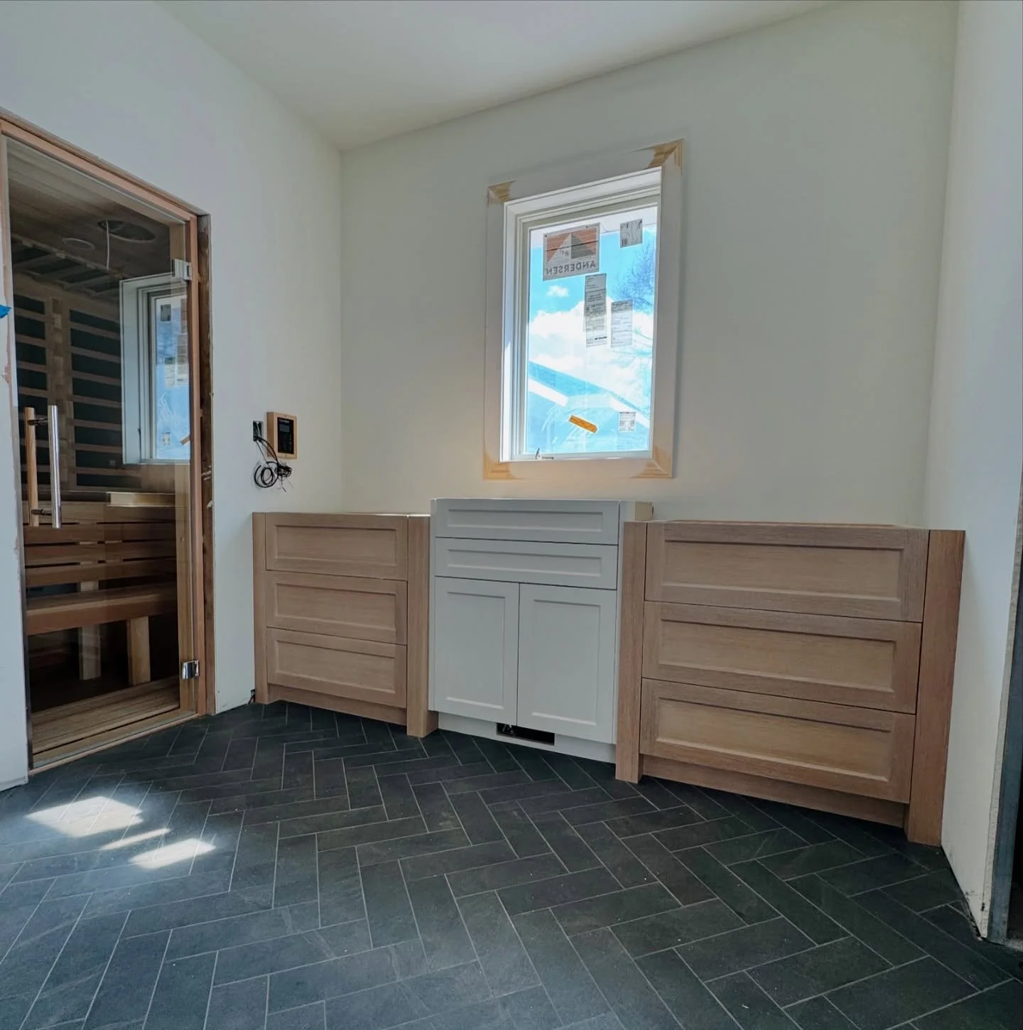 Handcrafted cabinetry, thoughtfully designed and meticulously installed, sets the tone for this beautiful bathroom. Up next: framed mirrors above the vanity, waterfall countertops, and countertop-to-ceiling moulding.

#vanity #bathroom #customcabinet