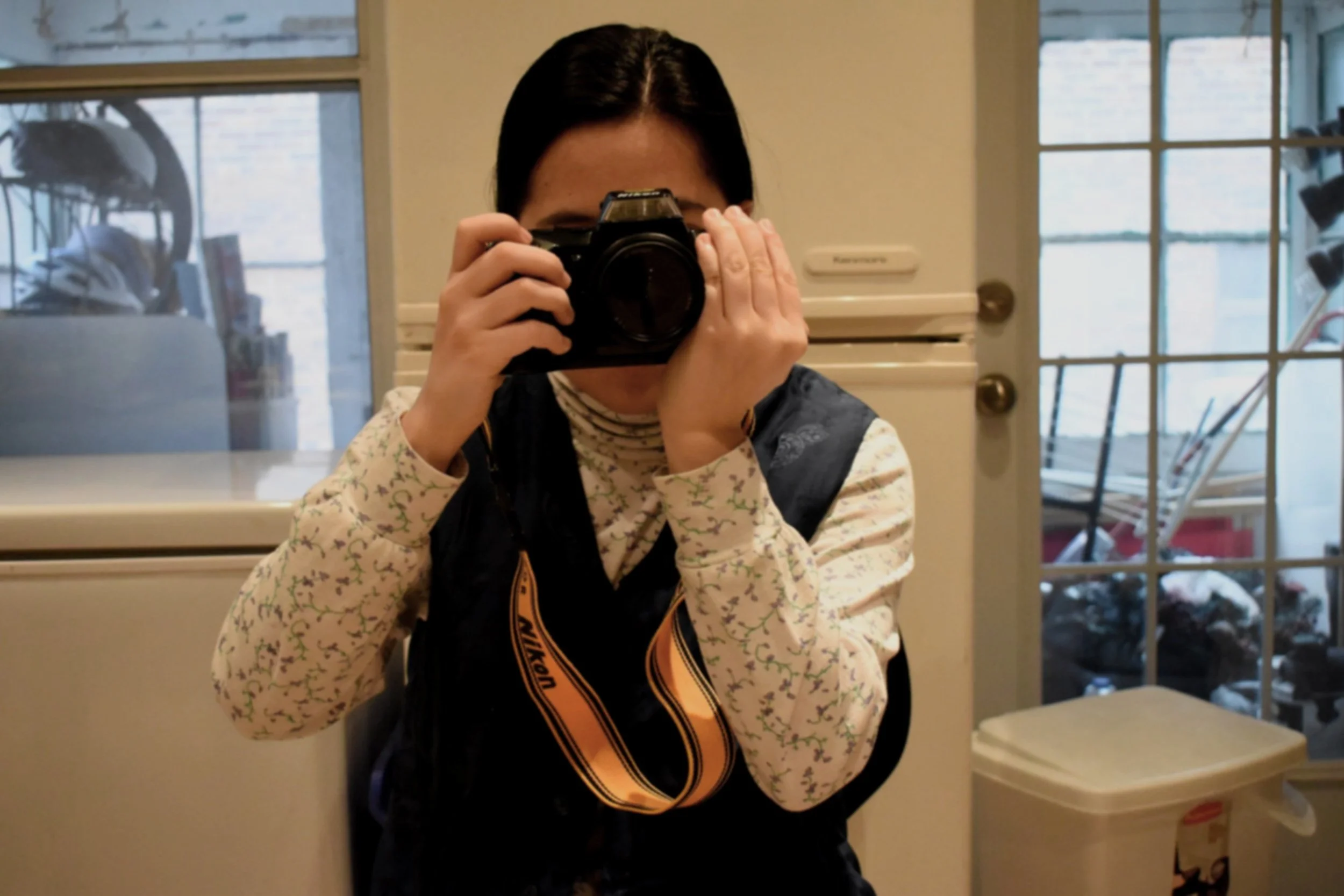"She was never without that camera. Always halted cutting the birthday cake to take just one more photo of her family members. Being a grandmother was a big part of her identity."
