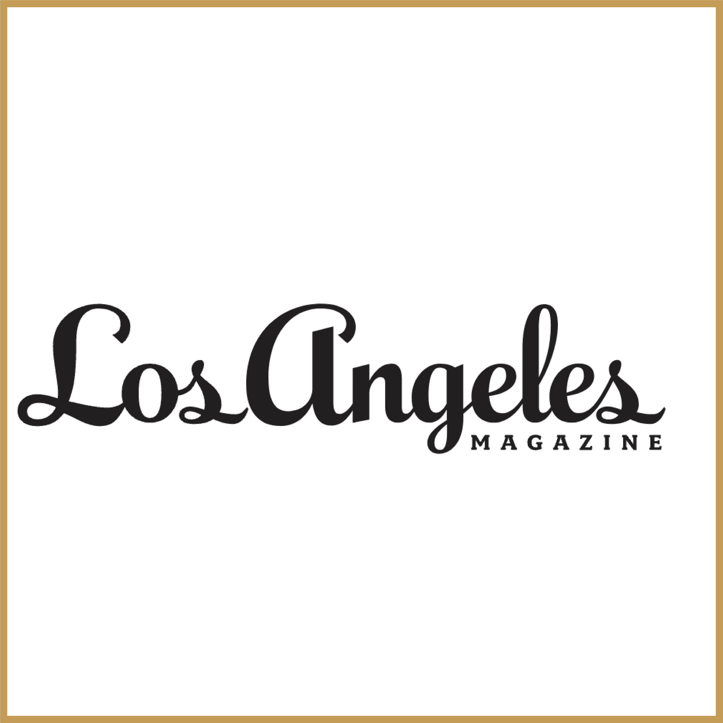 Logo of Los Angeles Magazine with black cursive text on a white background and gold border.